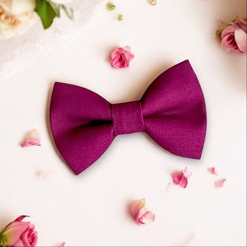 Purple Sangria bow tie on a white background with pink flowers