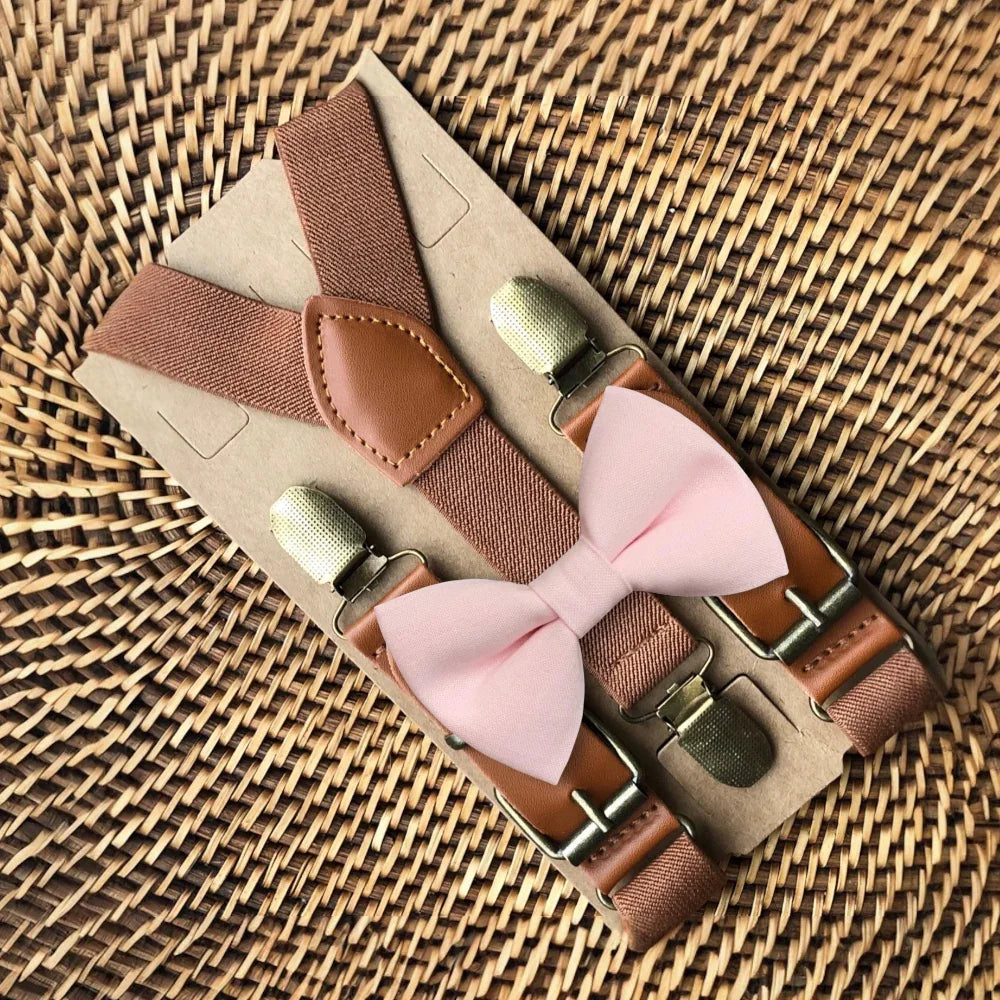 Size chart for suspender and bow tie sets from The Bold Bow Tie. X-Small (6mo-4yr): 15"-23" suspenders, 3.5" bow. Small (5-9yr): 18"-33" suspenders, 3.5" bow. Medium (10-12yr): 18"-33" suspenders, 4" bow. Adult (13yr-6'5"): 30"-53" suspenders, 4.5" bow. Big & Tall (Over 6'5"): 53"+ suspenders, 4.5" bow. Instructions note to measure from the back waistband over the shoulder to the front waistband for a comfortable fit.