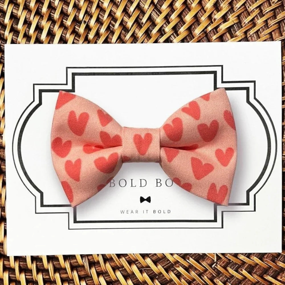 Pink heart dog bow tie or cat bow tie for Valentine's Day.