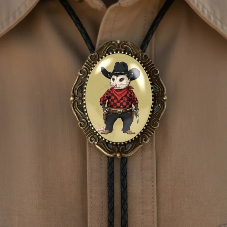 Opossum bolo tie with a skull wearing a cowboy hat and red plaid shirt on a beige shirt background