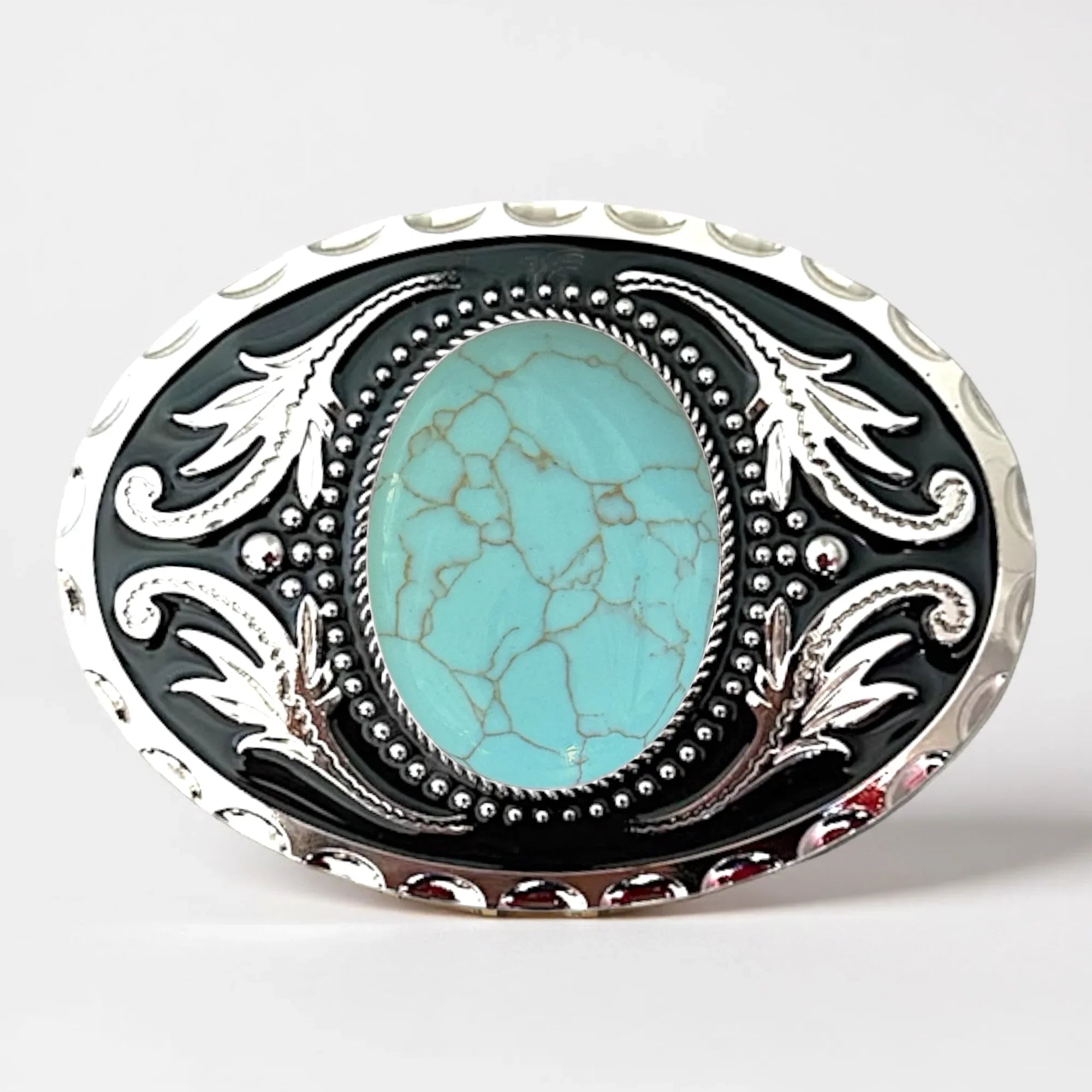 Turquoise Belt buckle with turquoise stone and silver detailing on a white background