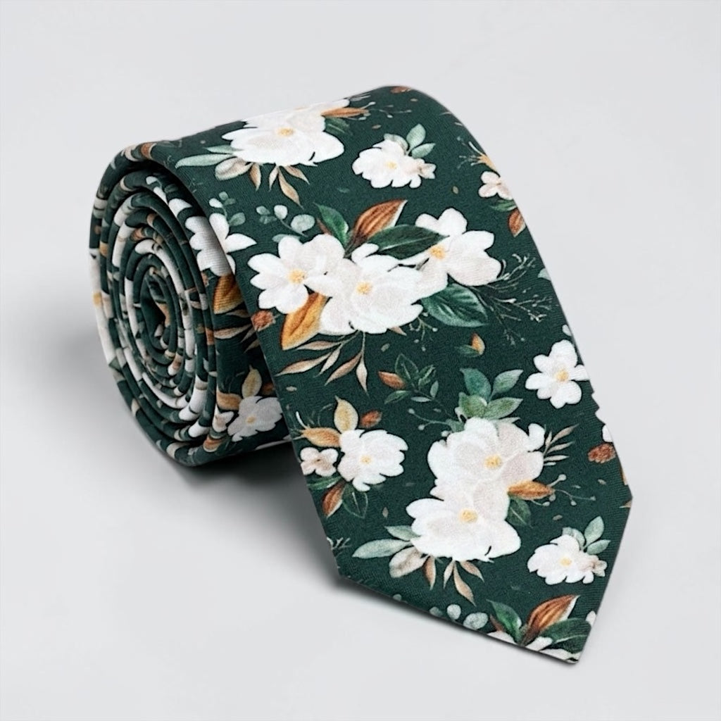 Floral men’s tie in emerald green white background by The Bold Bow Tie.