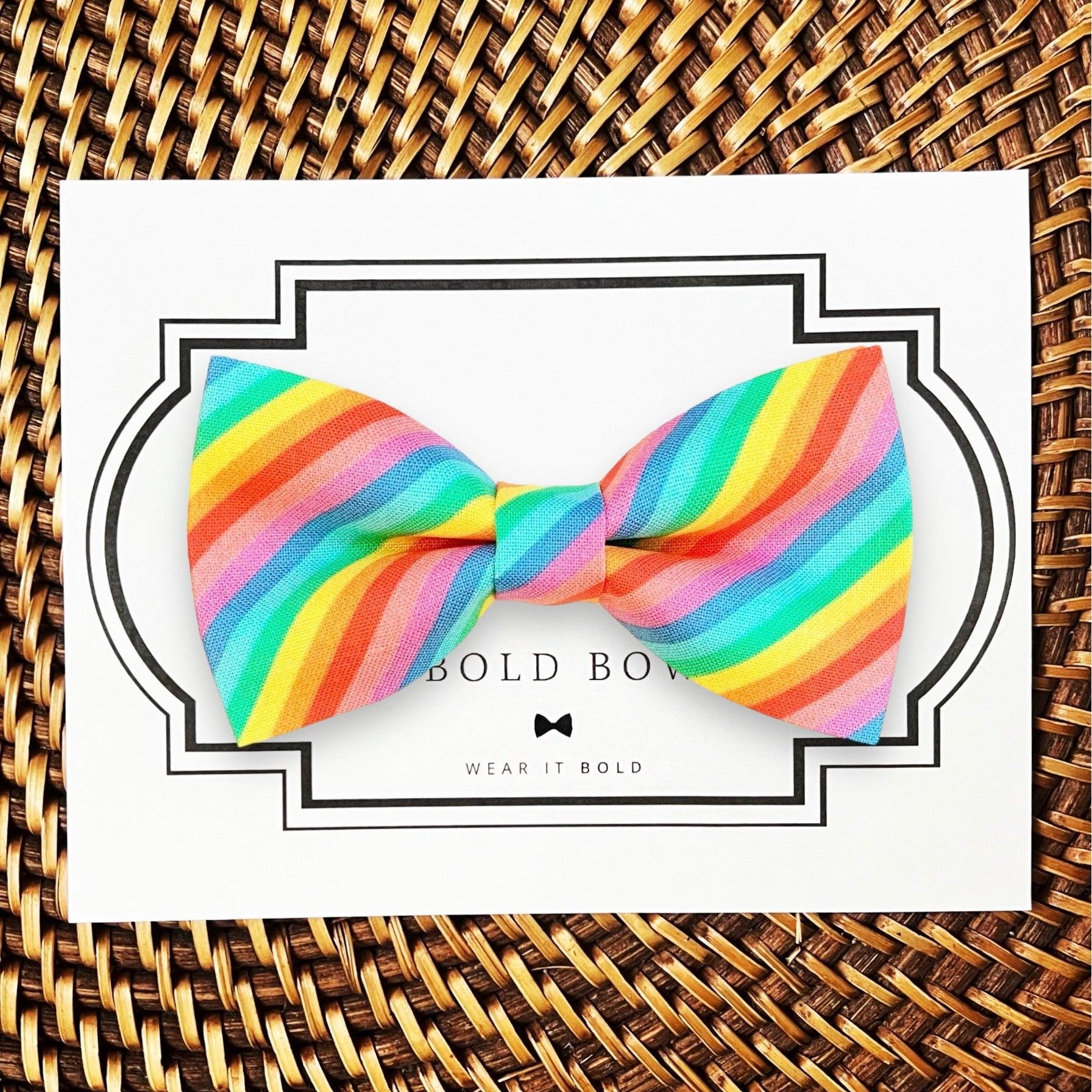 Dog bow tie size chart. Size Small is 3 1/2 inches wide for small dogs under 15 lbs. Size Medium is 4 inches wide for medium dogs between 15 band 40 lbs. Size Large is 4 1/2 inches wide for Large Dogs between 40 band 80 lbs. Size Extra Large is 5 1/2 inches wide for Extra Large Dogs over 80 lbs. Sizing is up to preference and pet bow ties slide on to dog collars with elastic.