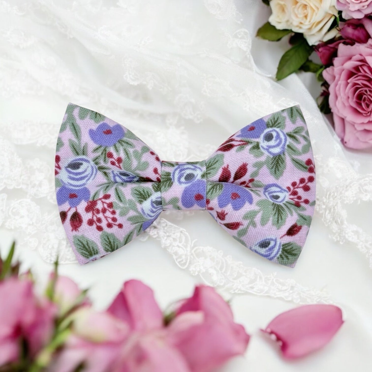 Lavender floral patterned bow tie on a white background for weddings groomsmen and ring bearers.