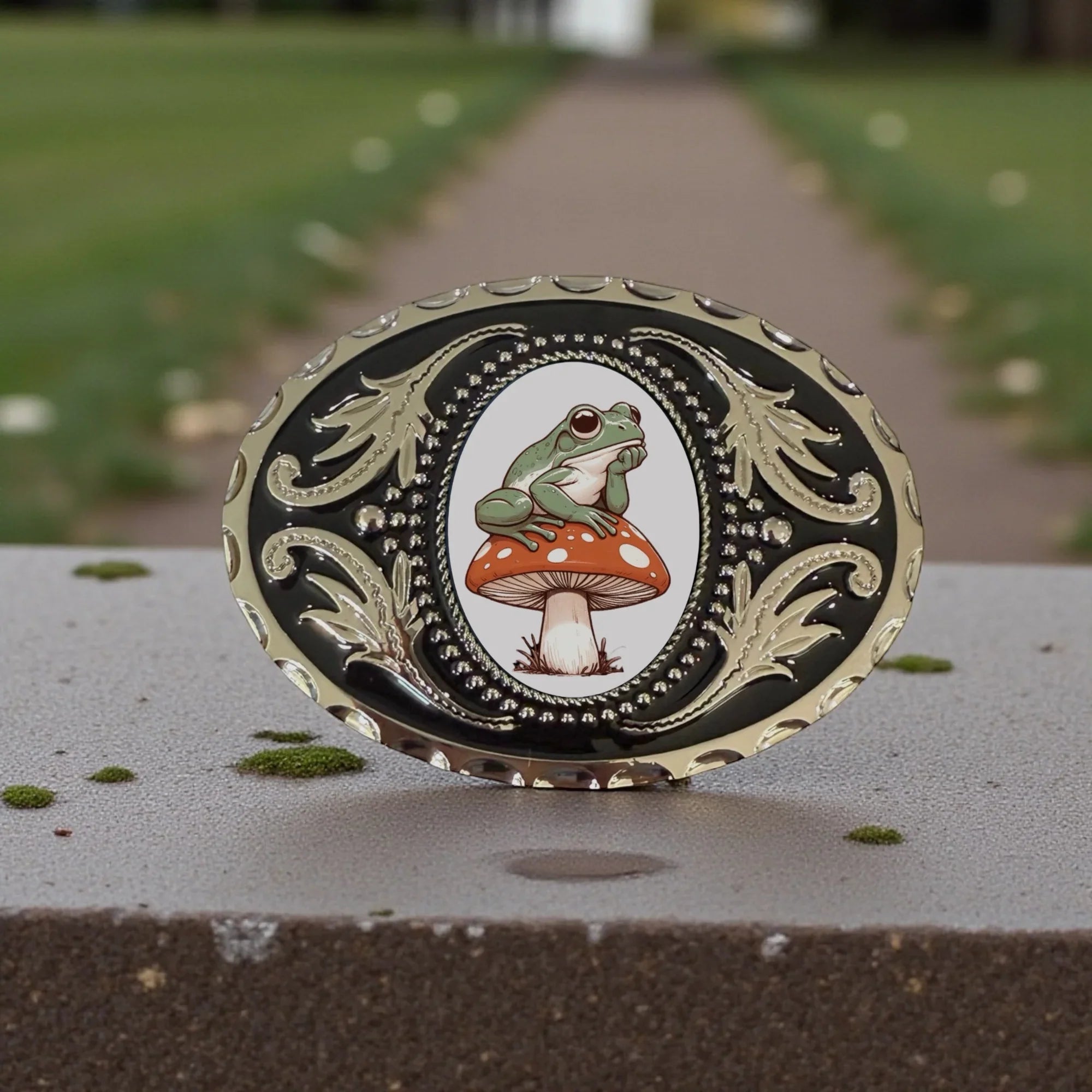 Two options for belt buckles: Option 1 has a leaf pattern and option 2 has flowers on it