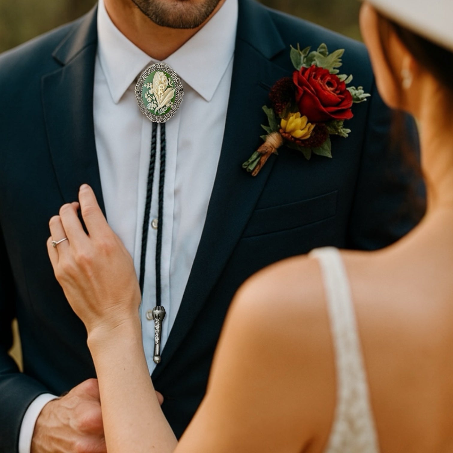 Silver Floral Green Lily of the Valley Bolo Tie for men for wedding, groomsmen, and ring bearer outfits.