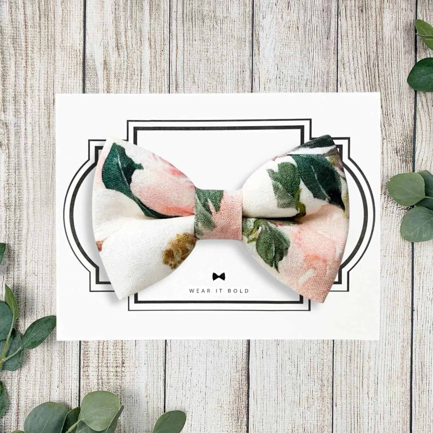 Floral dog bowties in pink and white for dog wedding photos.