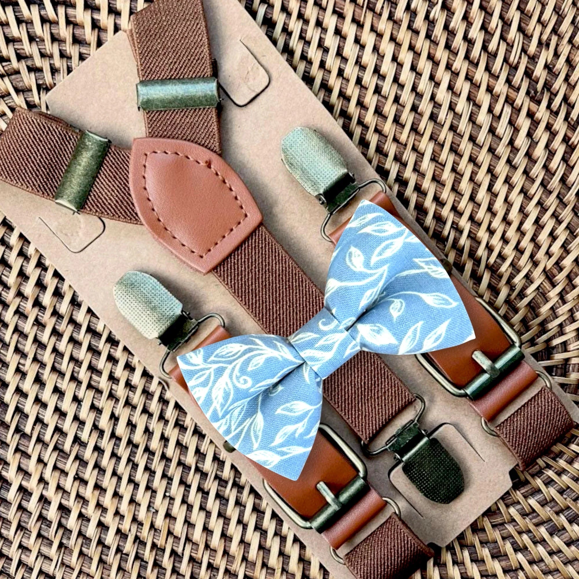 Dusty blue bow ties for men with brown suspenders