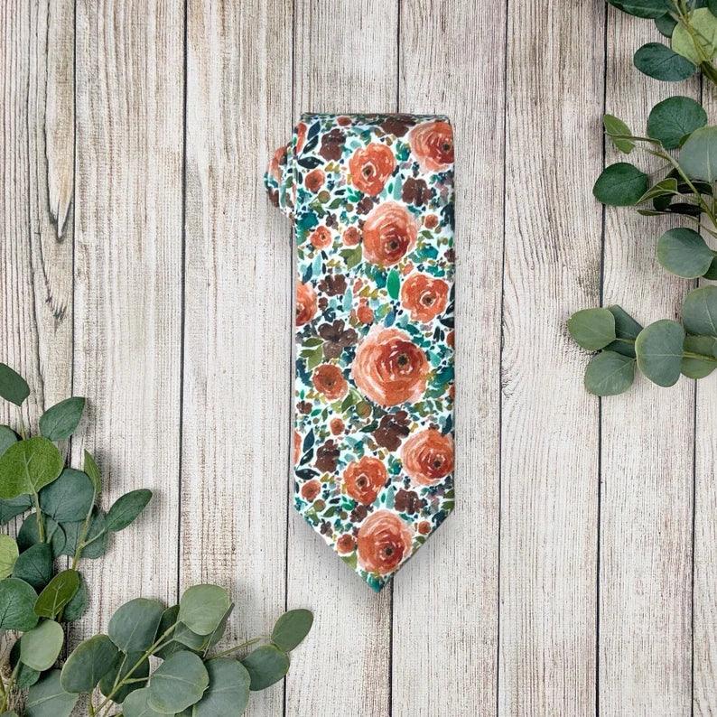Burnt orange floral men’s tie for wedding.
