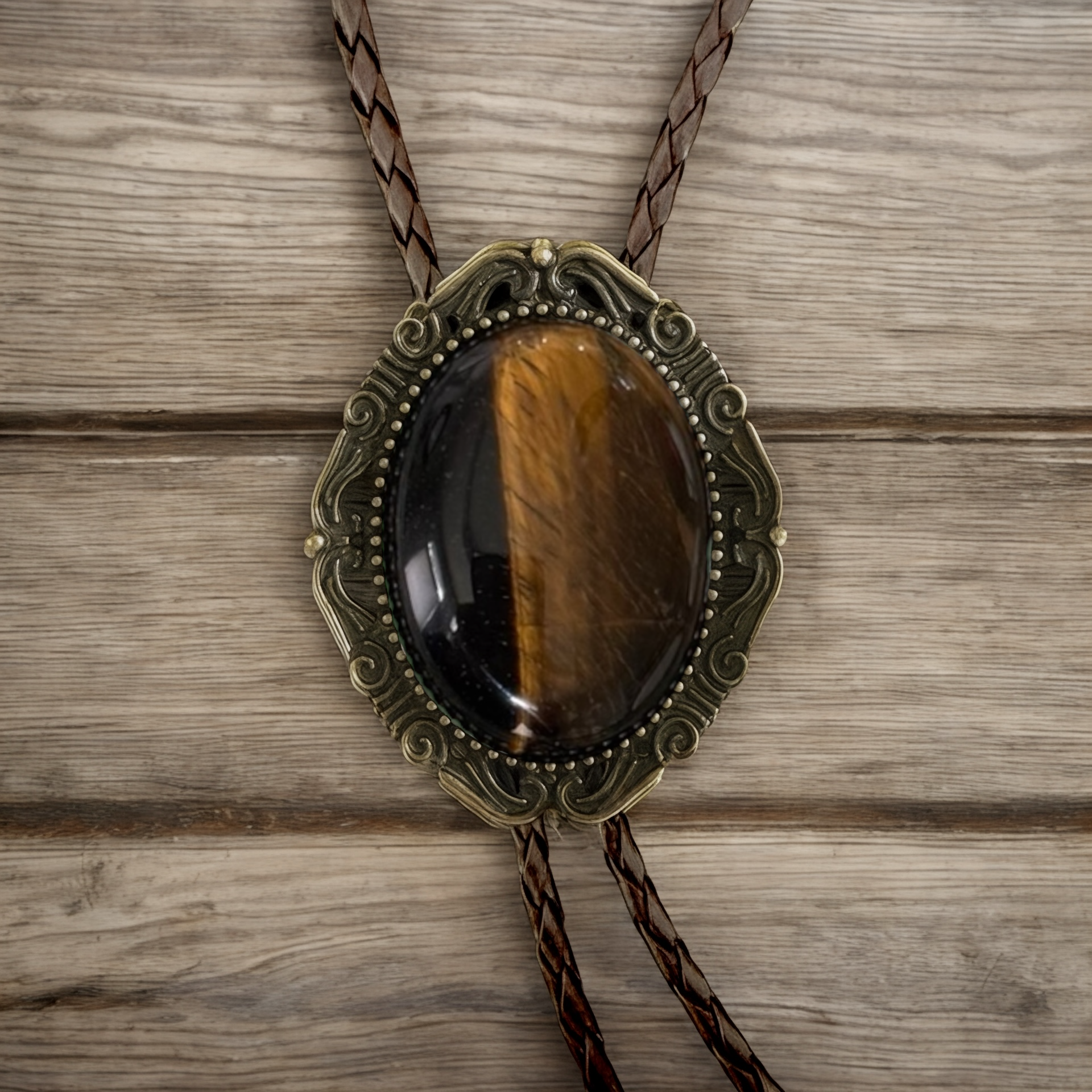 Handmade Tiger’s Eye bolo tie — polished gemstone western wedding accessory for grooms and groomsmen.