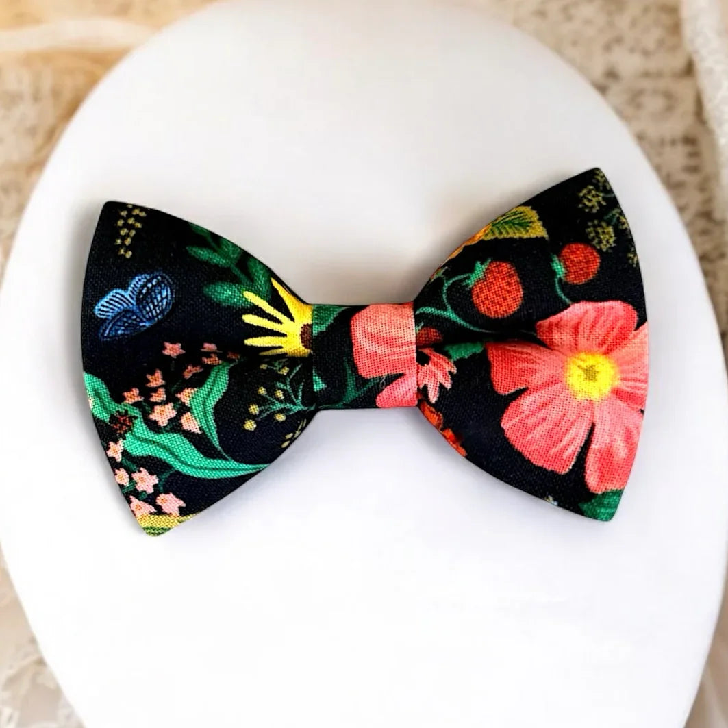 Black bow tie for men and toddlers with flowers for weddings.