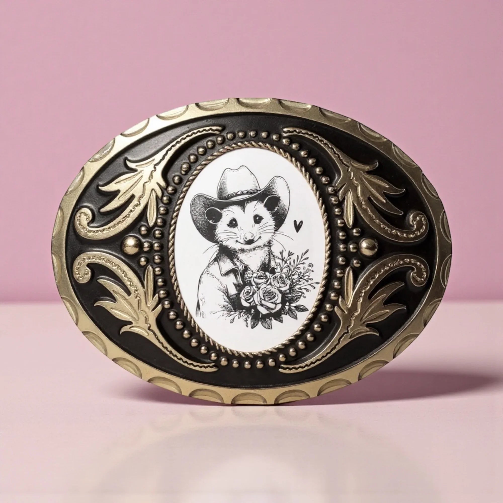 Two options for belt buckles: Option 1 has a leaf pattern and option 2 has flowers on it