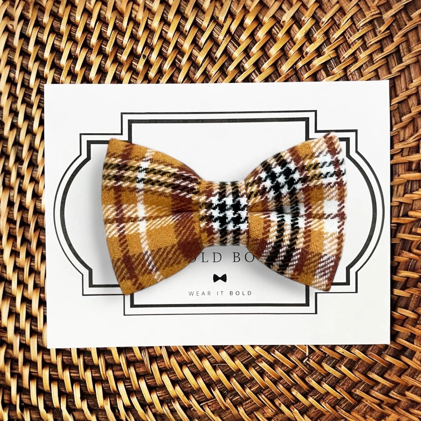 Dog bow tie size chart. Size Small is 3 1/2 inches wide for small dogs under 15 lbs. Size Medium is 4 inches wide for medium dogs between 15 band 40 lbs. Size Large is 4 1/2 inches wide for Large Dogs between 40 band 80 lbs. Size Extra Large is 5 1/2 inches wide for Extra Large Dogs over 80 lbs. Sizing is up to preference and pet bow ties slide on to dog collars with elastic.