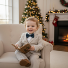 Child in Christmas bowtie