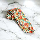 Burnt orange floral men’s tie for wedding.