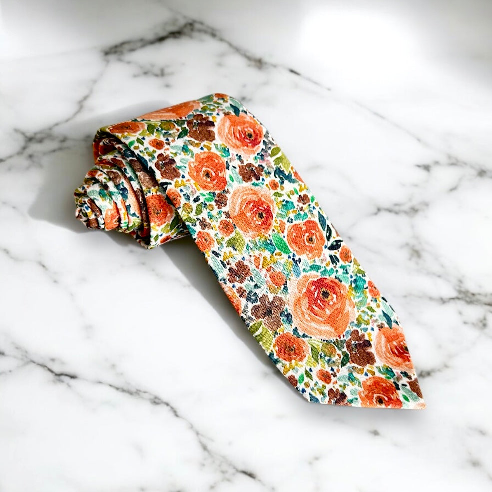 Burnt orange floral men’s tie for wedding.