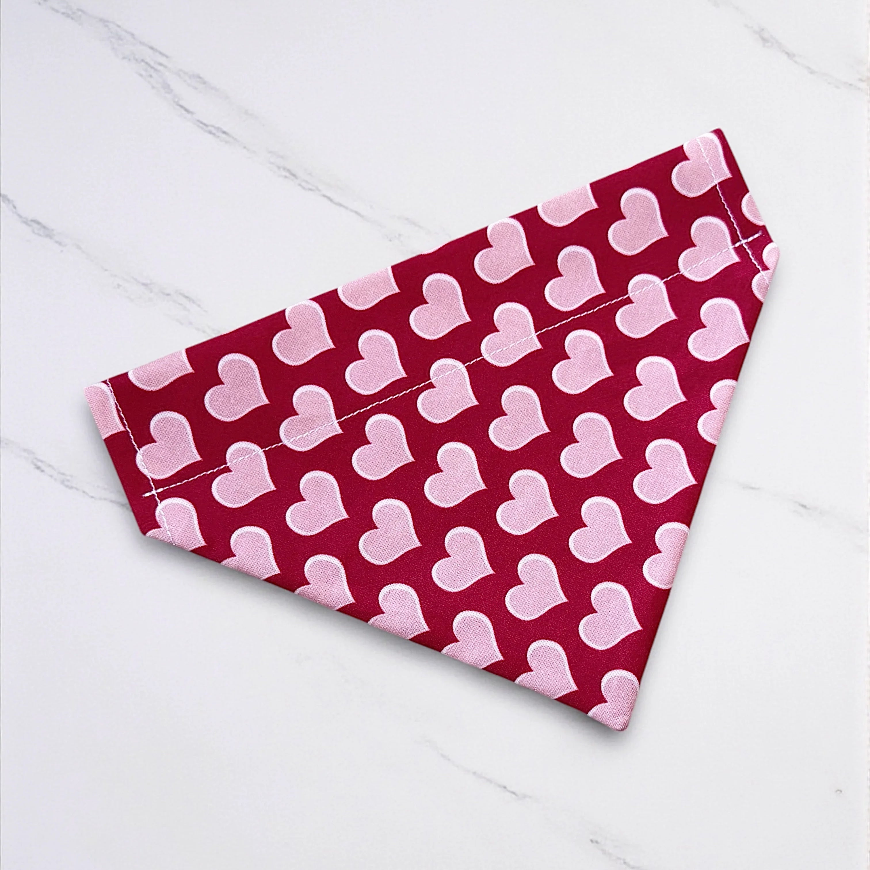 Valentine's Day dog bandana with hearts.