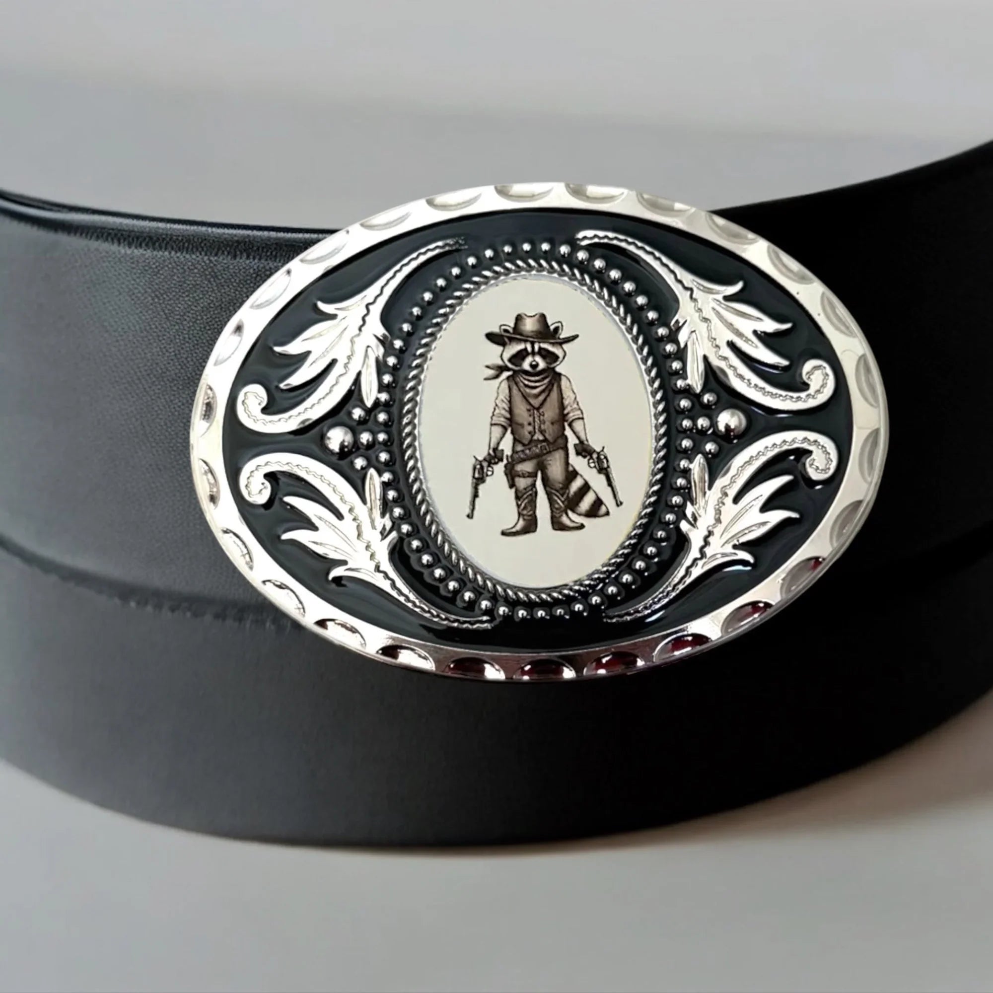 Two options for belt buckles: Option 1 has a leaf pattern and option 2 has flowers on it