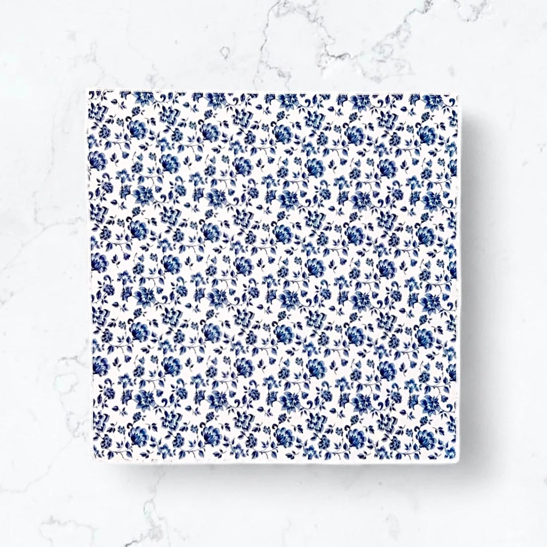 White and blue floral pocket square for wedding or special event.