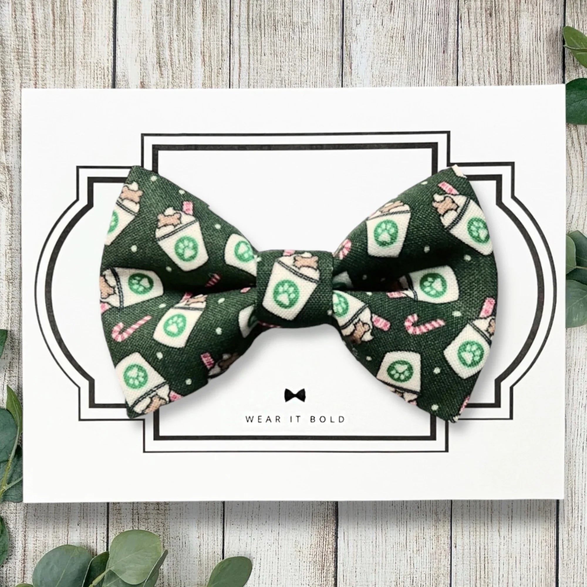 Christmas dog bowtie in green with coffee cups.