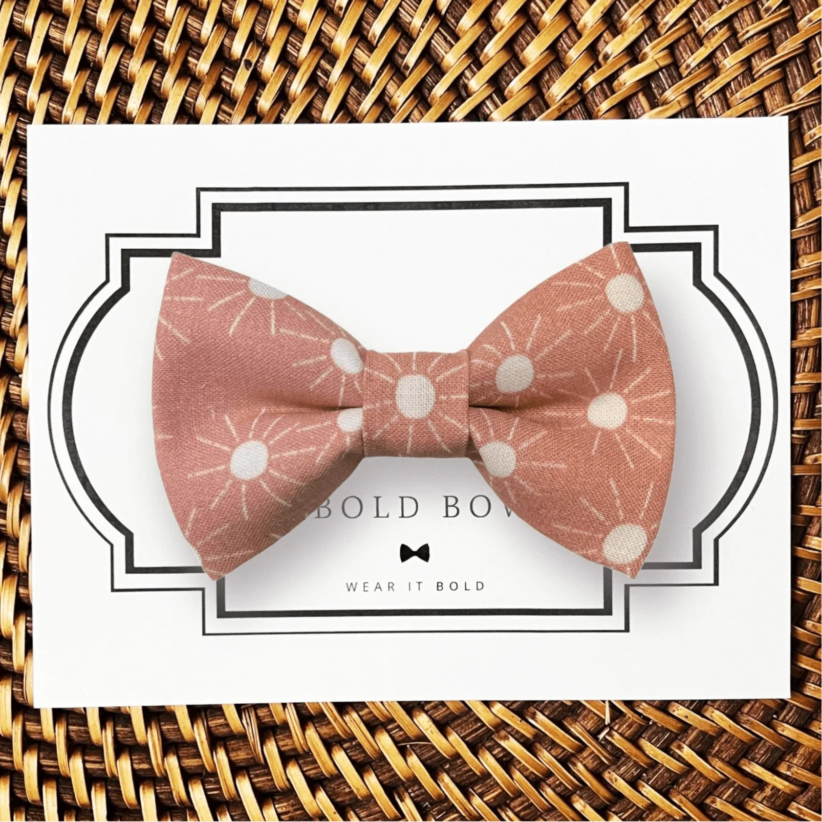 Dog bow tie size chart. Size Small is 3 1/2 inches wide for small dogs under 15 lbs. Size Medium is 4 inches wide for medium dogs between 15 band 40 lbs. Size Large is 4 1/2 inches wide for Large Dogs between 40 band 80 lbs. Size Extra Large is 5 1/2 inches wide for Extra Large Dogs over 80 lbs. Sizing is up to preference and pet bow ties slide on to dog collars with elastic.