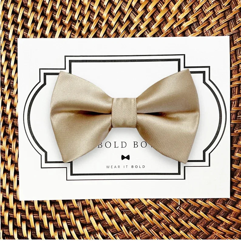 Bow Size Chart: Large: 4 1/2 inches wide by 2 1/2 inches tall Medium: 4 inches wide by 2 1/2 inches tall Small: 3 inches wide by 2 inches tall