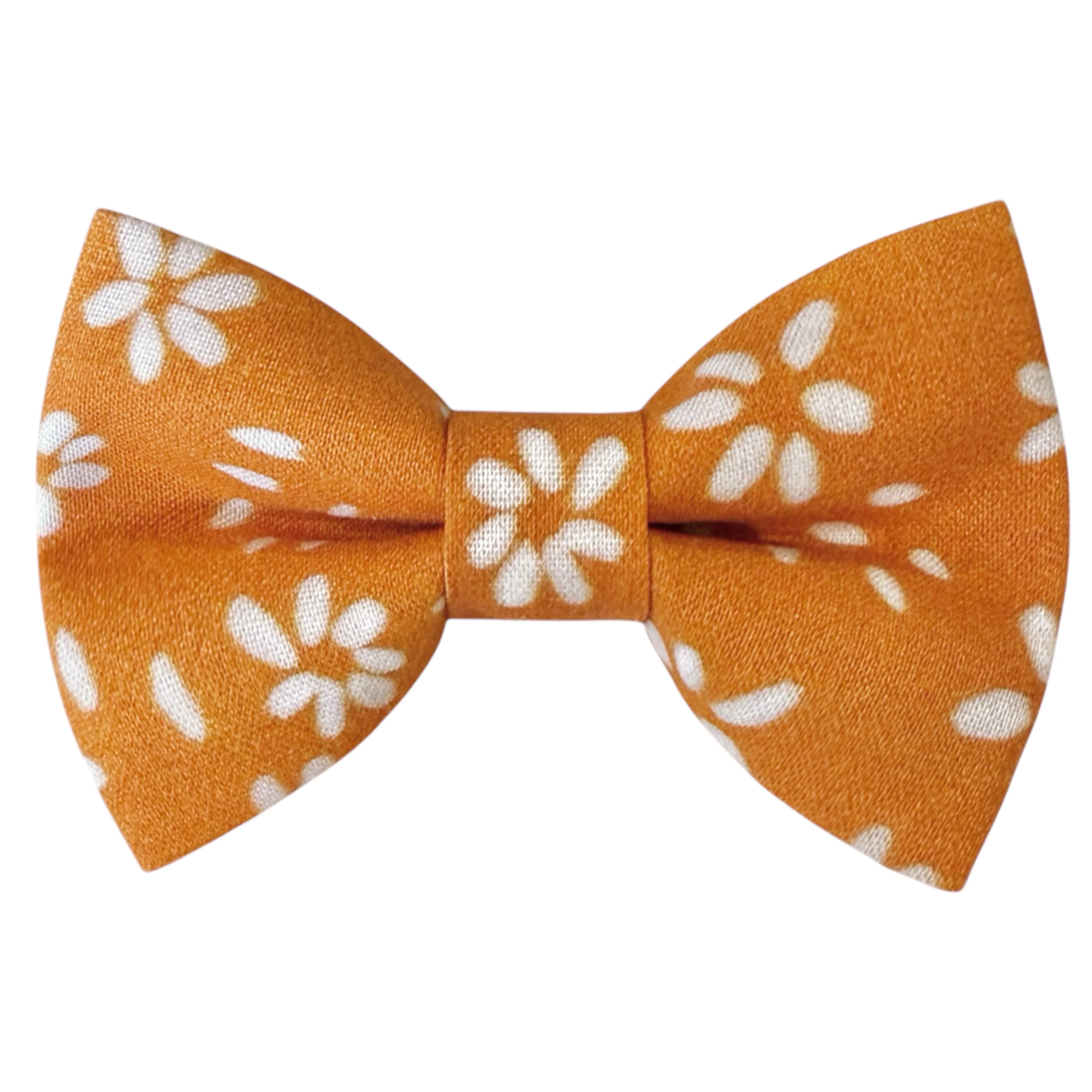 Orange bow tie with white floral pattern on a white background
