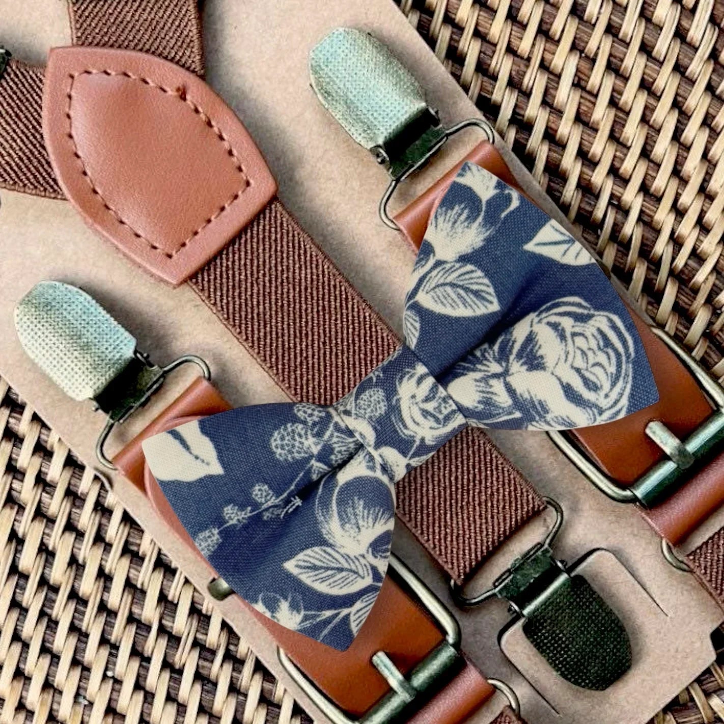 Blue bow tie and suspenders in floral print for wedding