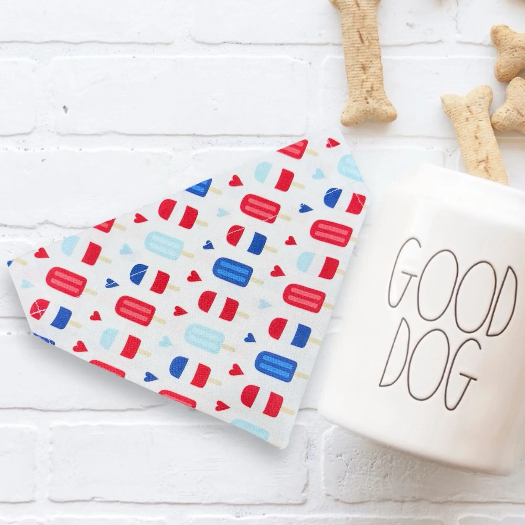 Fourth of July dog bandana with red white and blue popsicles.