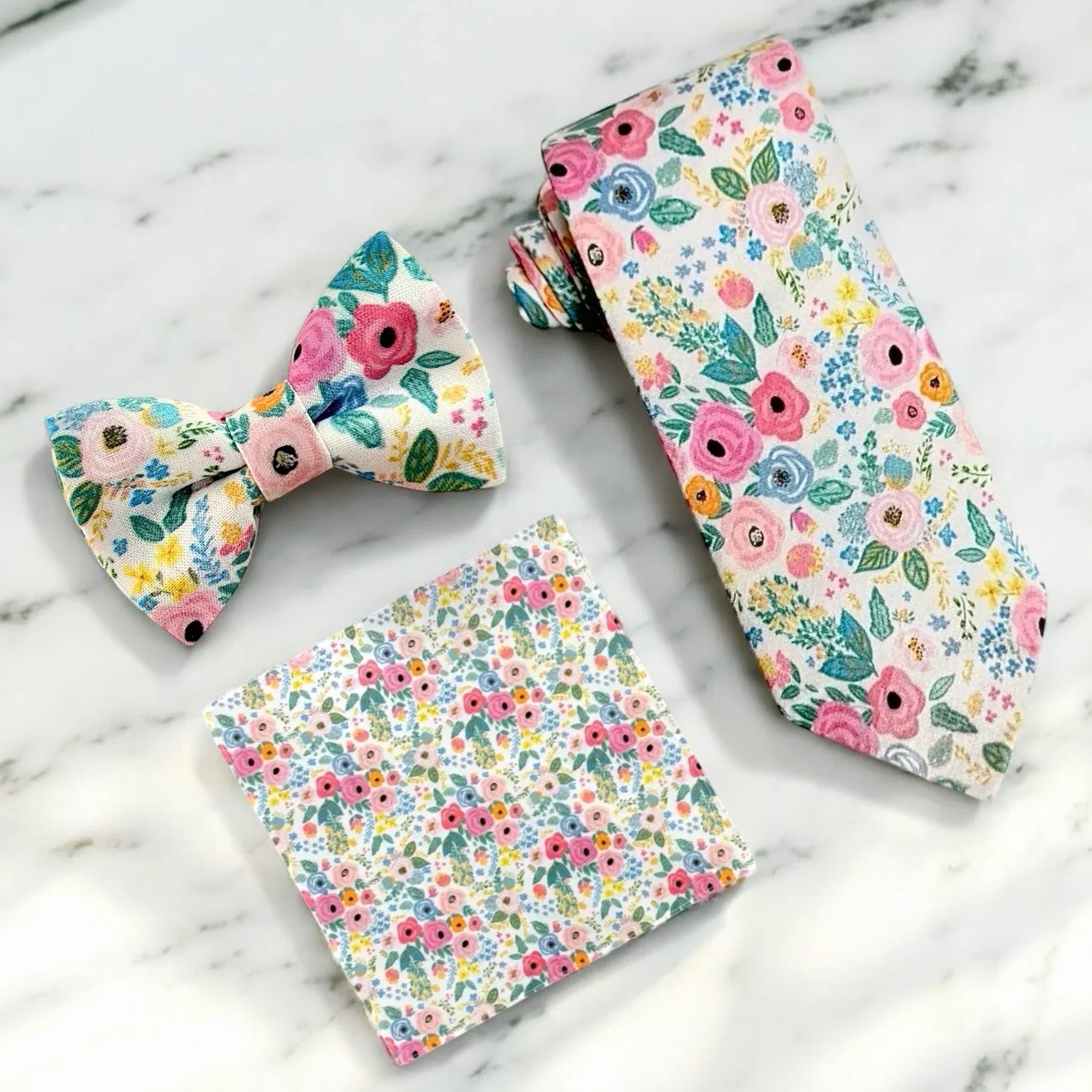 Floral mens tie for groomsmen, wedding, with matching bowtie and pocket square.