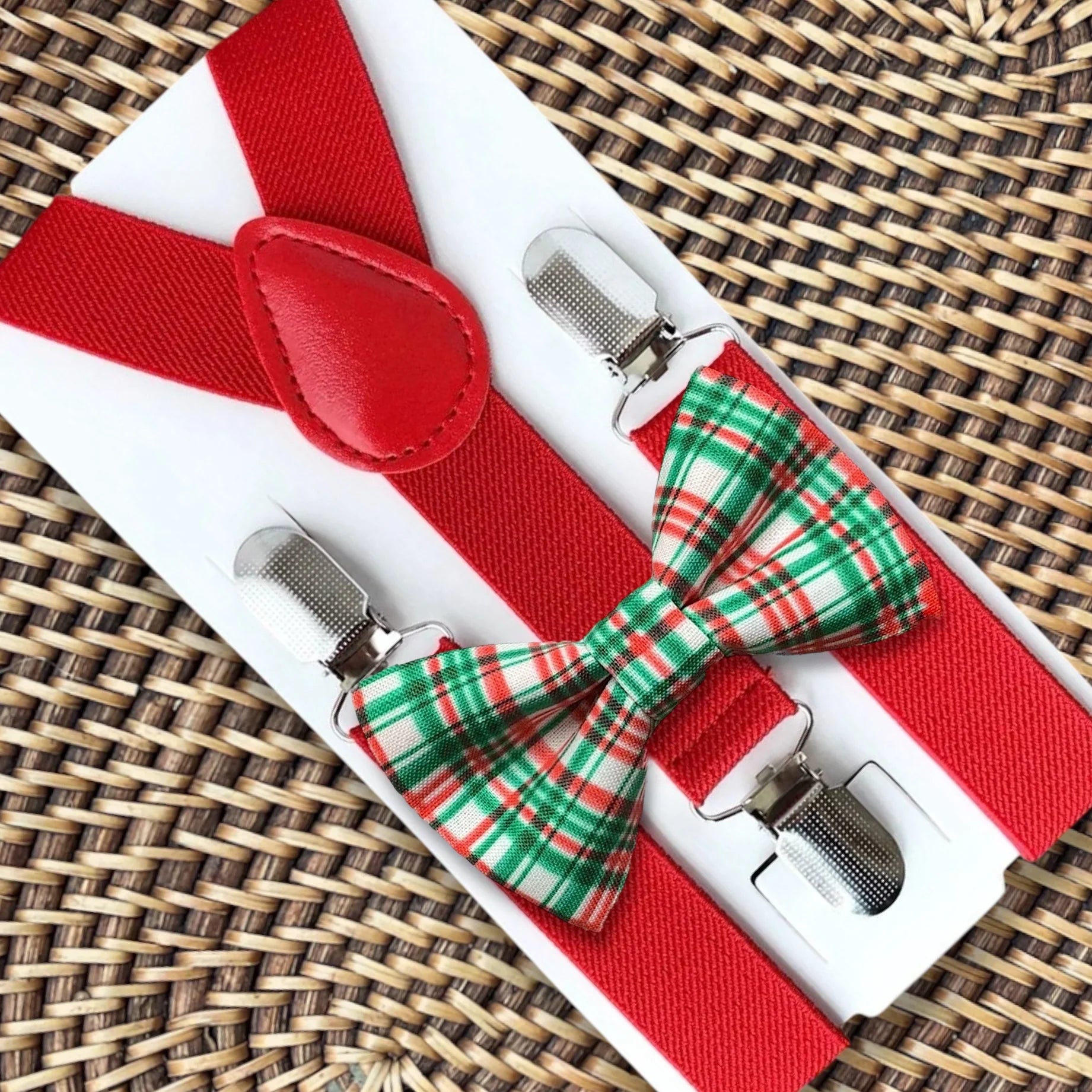 Red and green plaid bow tie and suspenders.