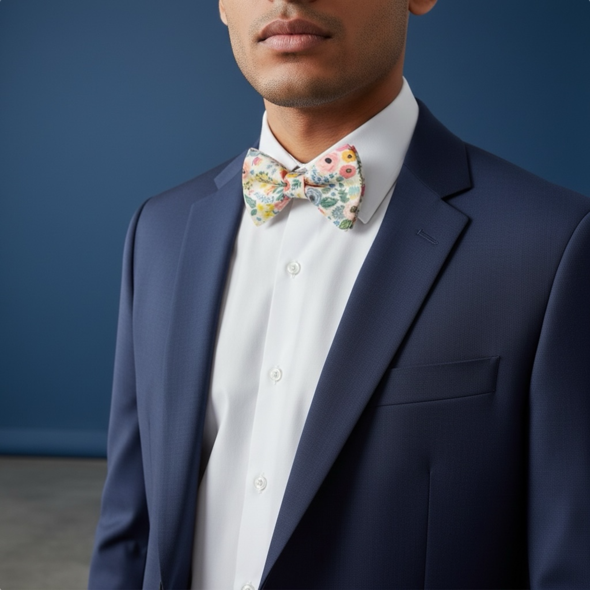 Wonderland garden bow tie worn by a groom in a wedding.