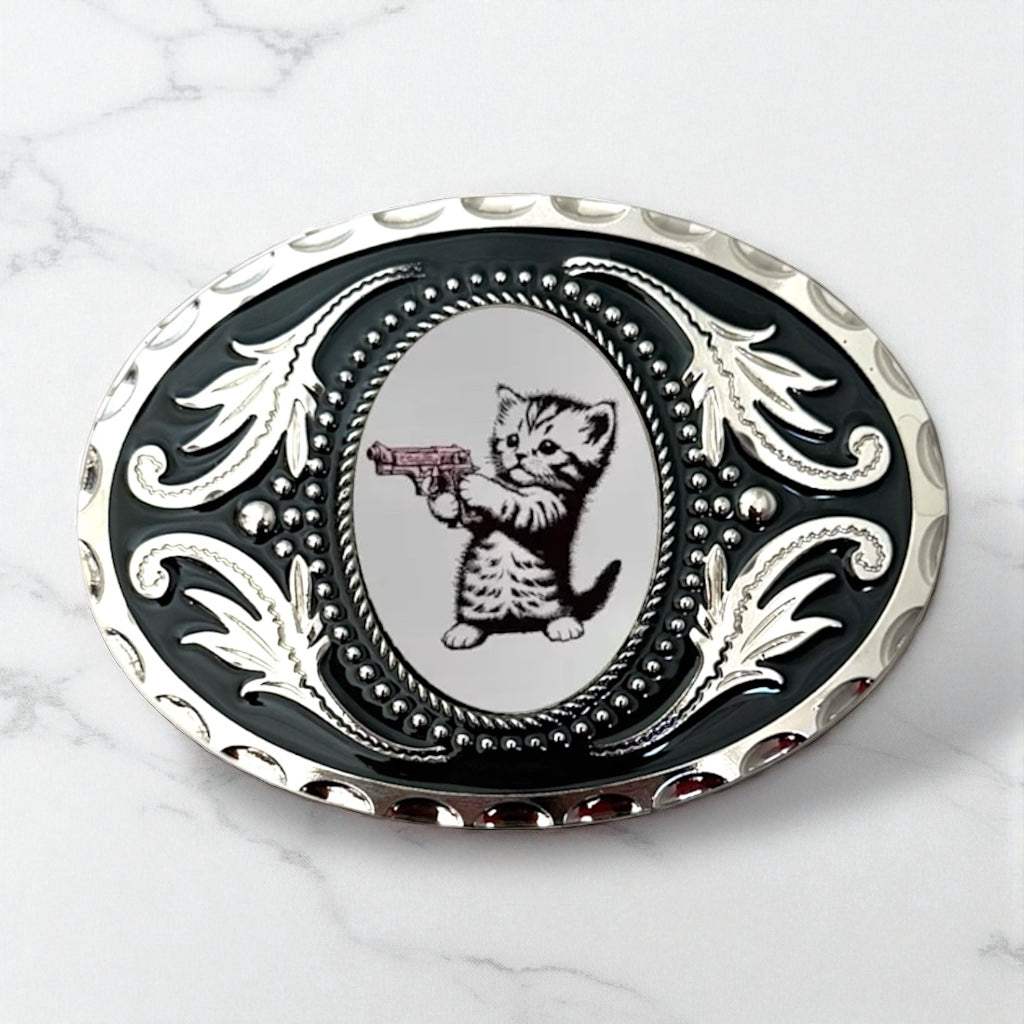 Kitten Belt Buckle Western Accessory on marble countertop