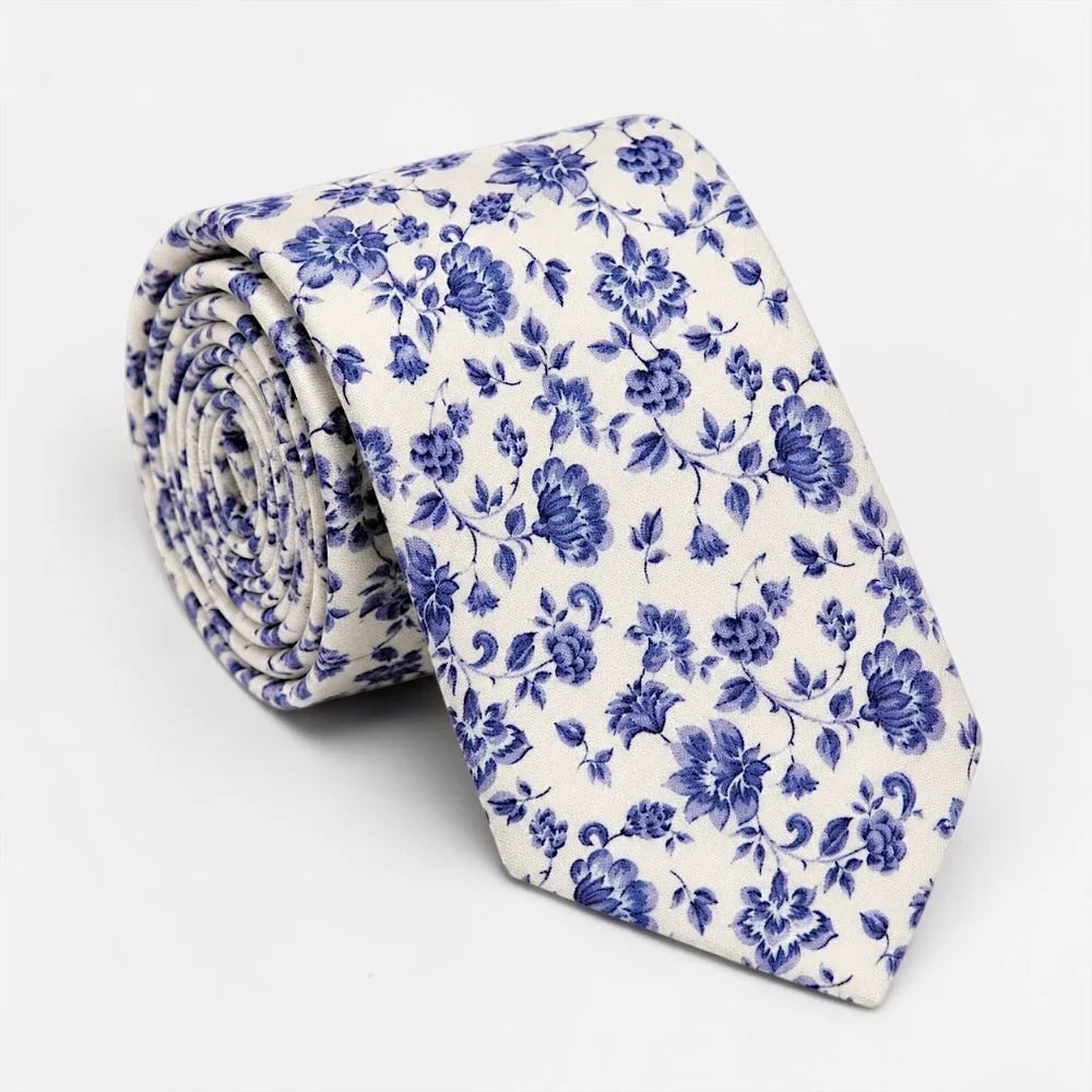 Blue floral tie for men and groomsmen in weddings.