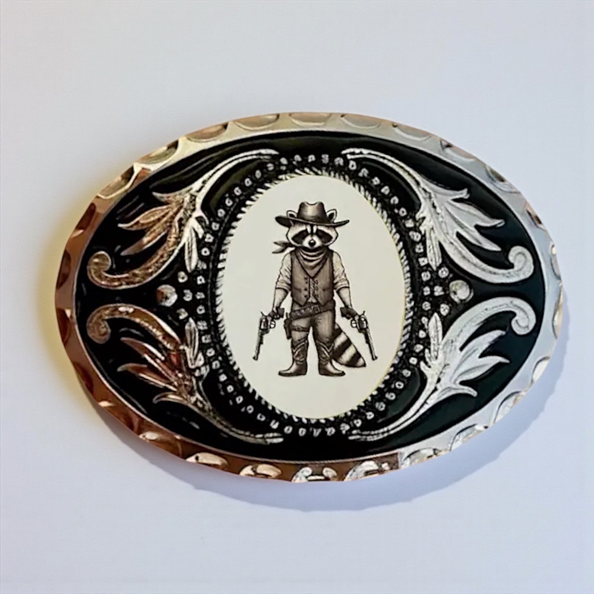 Decorative funny belt buckle with a raccoon dressed as a cowboy design on a white background