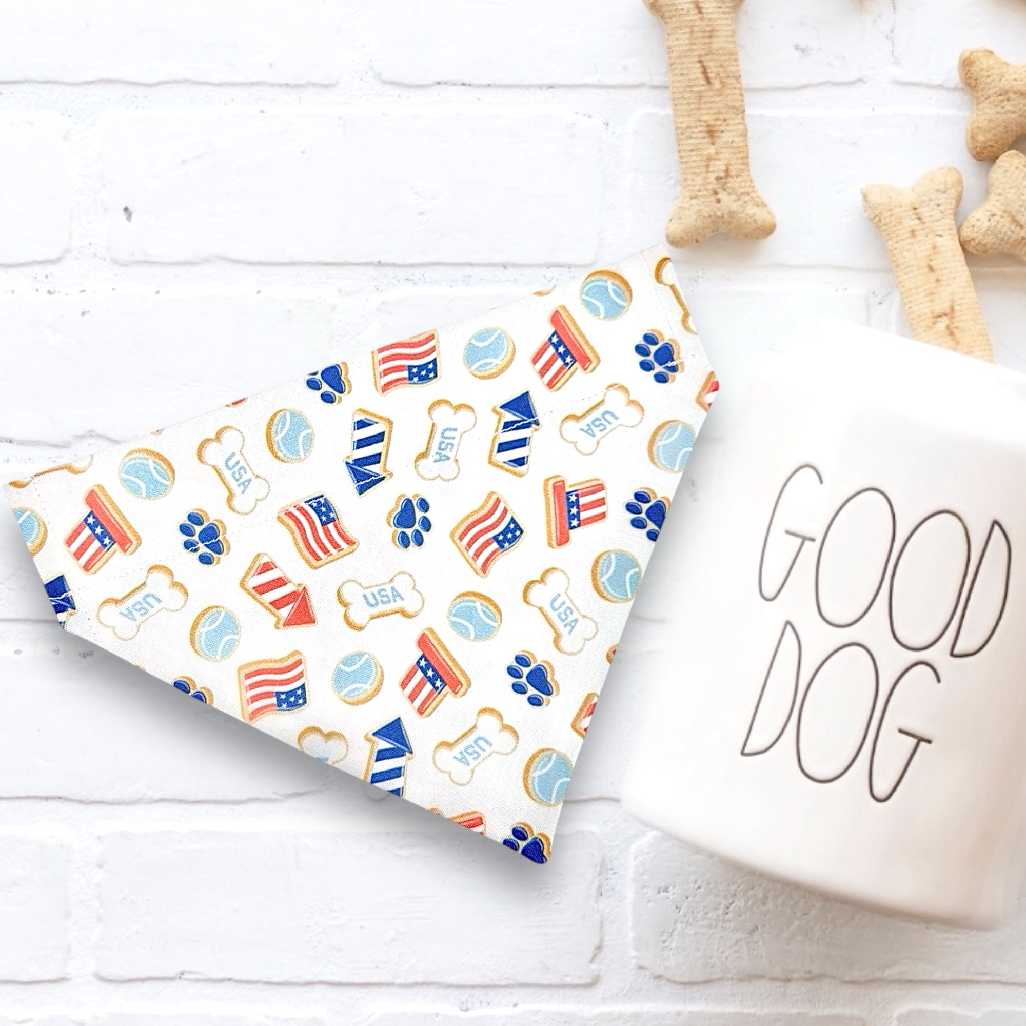 Fourth of July Dog Bandana for Independence Day in red white and blue flags, paw prints and patriotic hats.