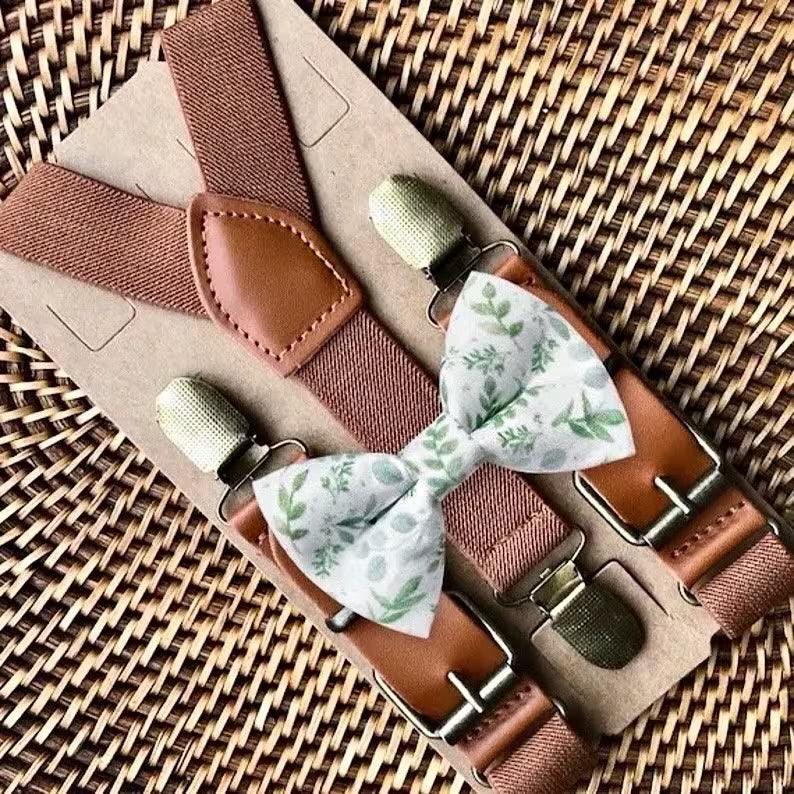 Size chart for suspender and bow tie sets from The Bold Bow Tie. X-Small (6mo-4yr): 15"-23" suspenders, 3.5" bow. Small (5-9yr): 18"-33" suspenders, 3.5" bow. Medium (10-12yr): 18"-33" suspenders, 4" bow. Adult (13yr-6'5"): 30"-53" suspenders, 4.5" bow. Big & Tall (Over 6'5"): 53"+ suspenders, 4.5" bow. Instructions note to measure from the back waistband over the shoulder to the front waistband for a comfortable fit.