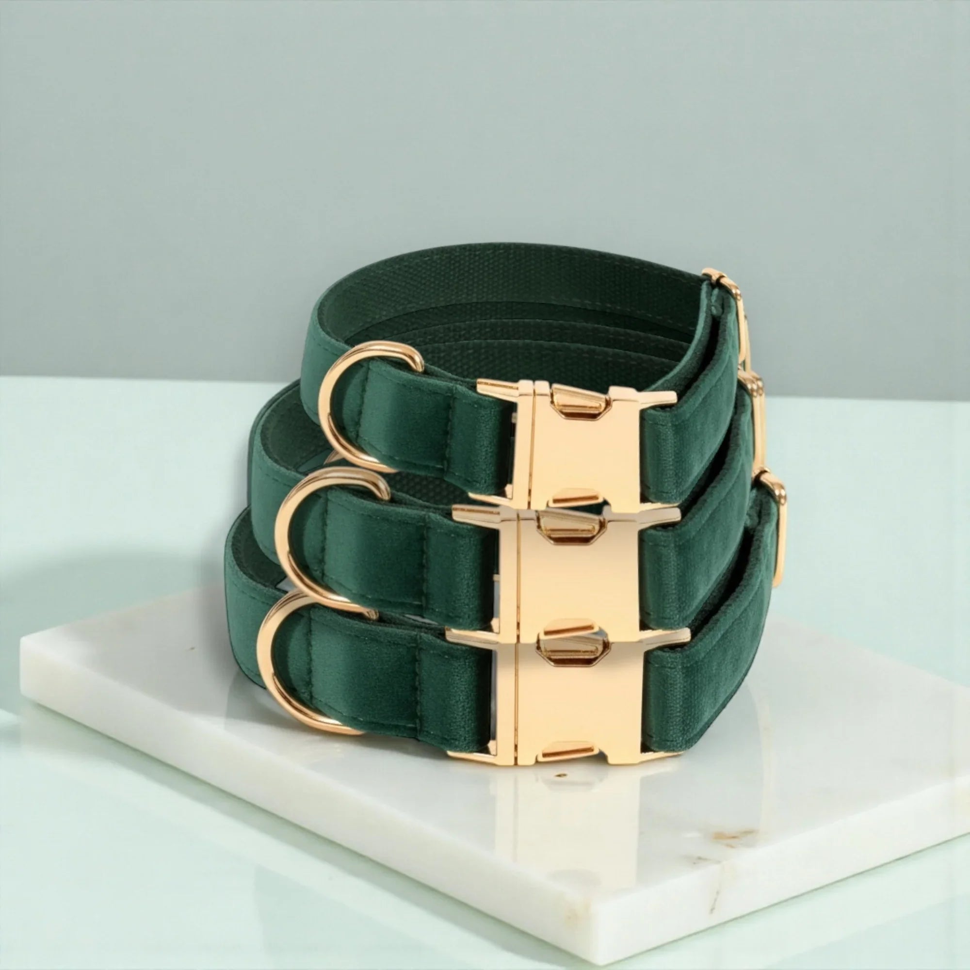 Green Velvet Dog Collars On white table