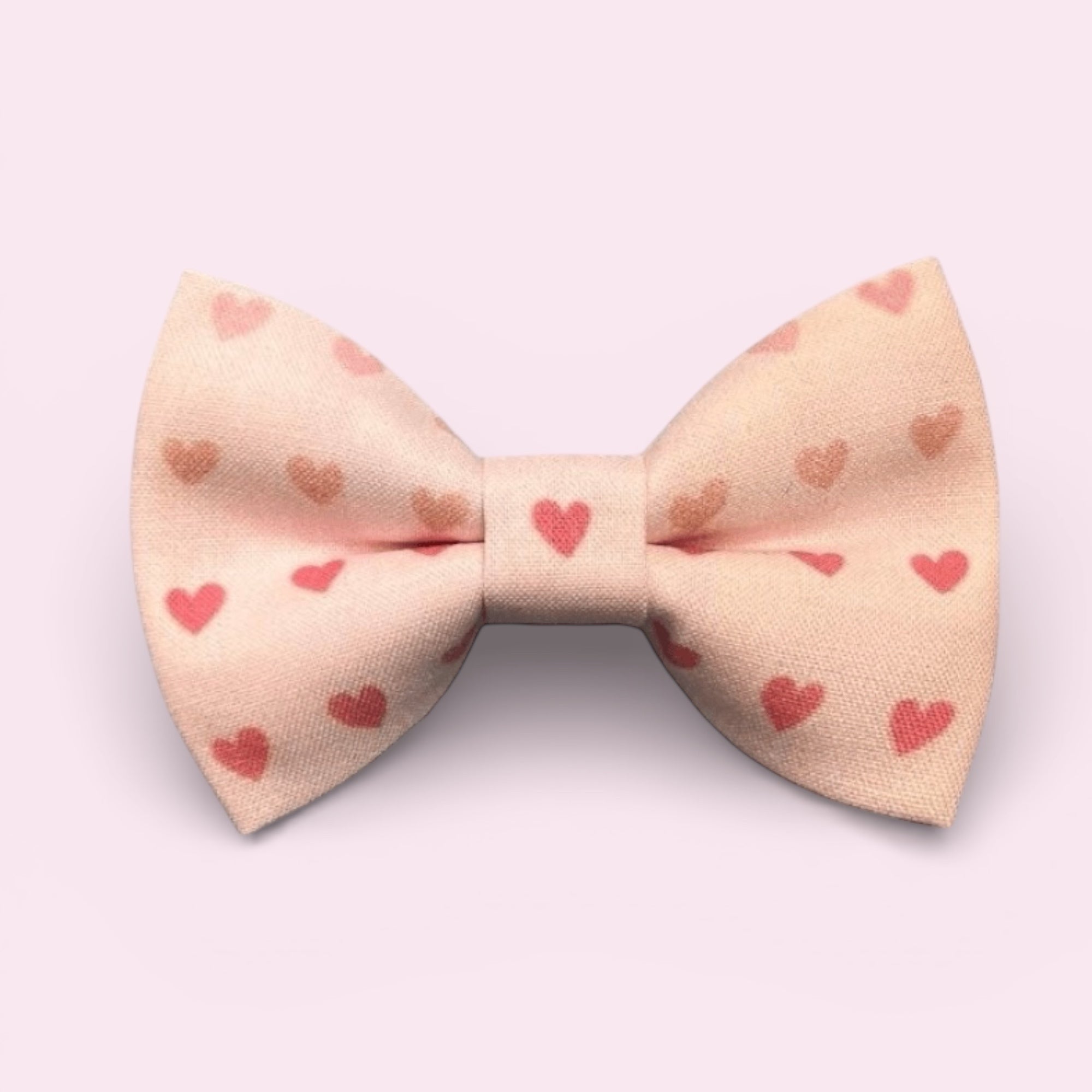 Pink heart hair bow for Valentines Day light pink background for all ages.