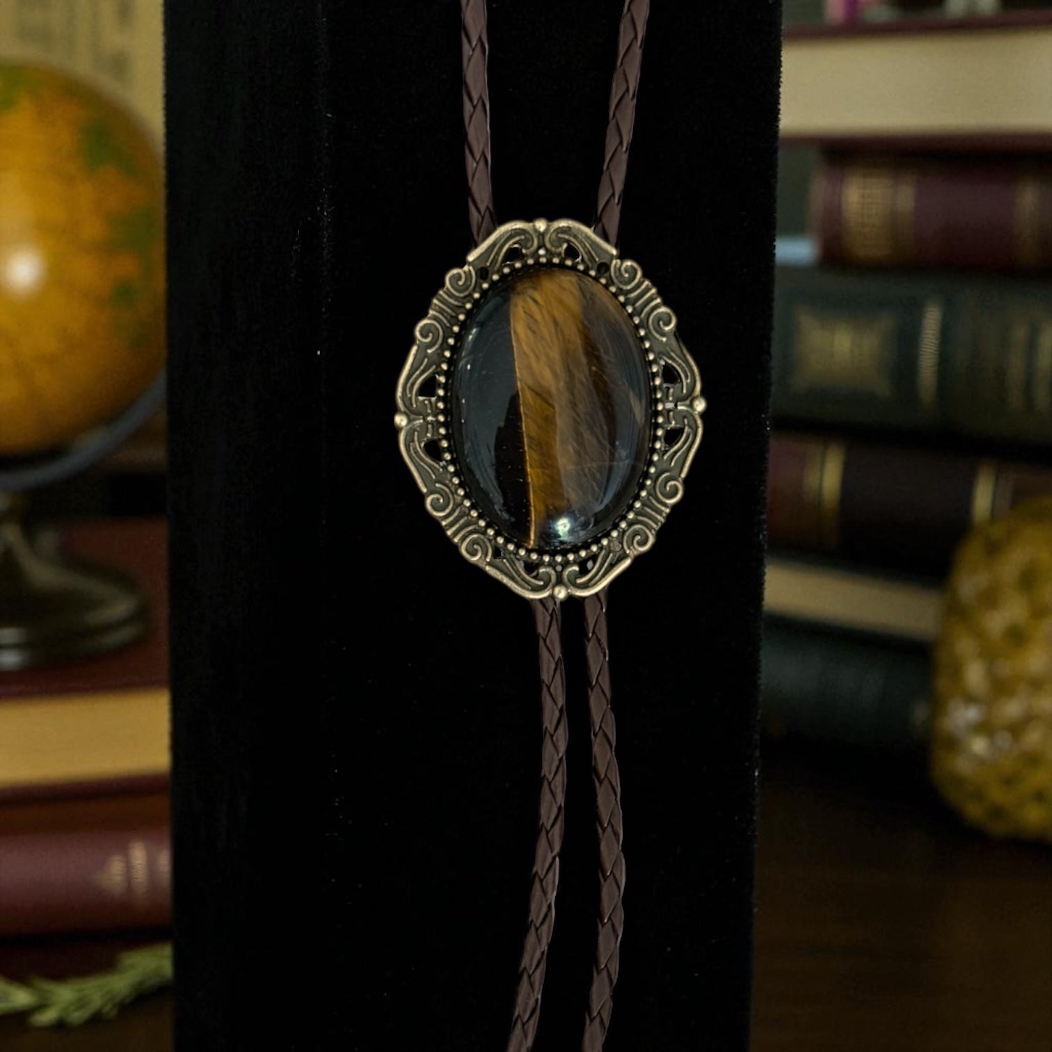 Western bolo tie with Tiger’s Eye gemstone pendant — handcrafted groomsmen gift and formal western accessory.