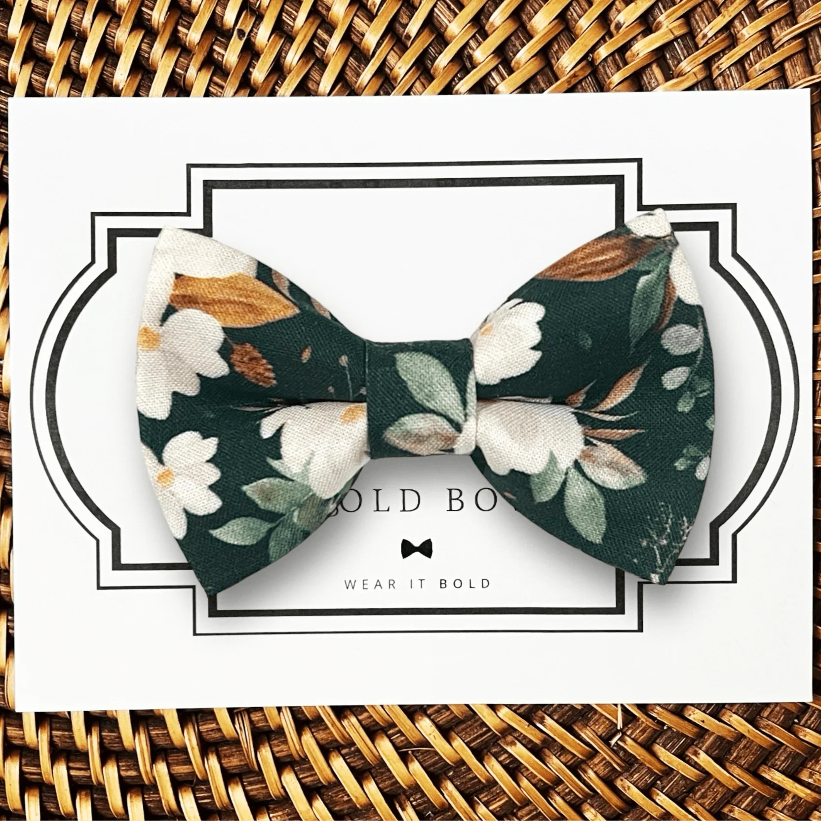 Size chart for pre-tied bow ties from The Bold Bow Tie detailing measurements across three sizes. Small is 3.5 inches wide and recommended for ages 6 months to 5 years. Medium is 4 inches wide and recommended for ages 6 to 12 years. Large is 4.5 inches wide and recommended for ages 13 years and up. Visual icons illustrate the relative sizes with horizontal arrows showing that width is measured from wingtip to wingtip. Bottom text notes that all bow ties are pre-tied and ready to add to your outfit.