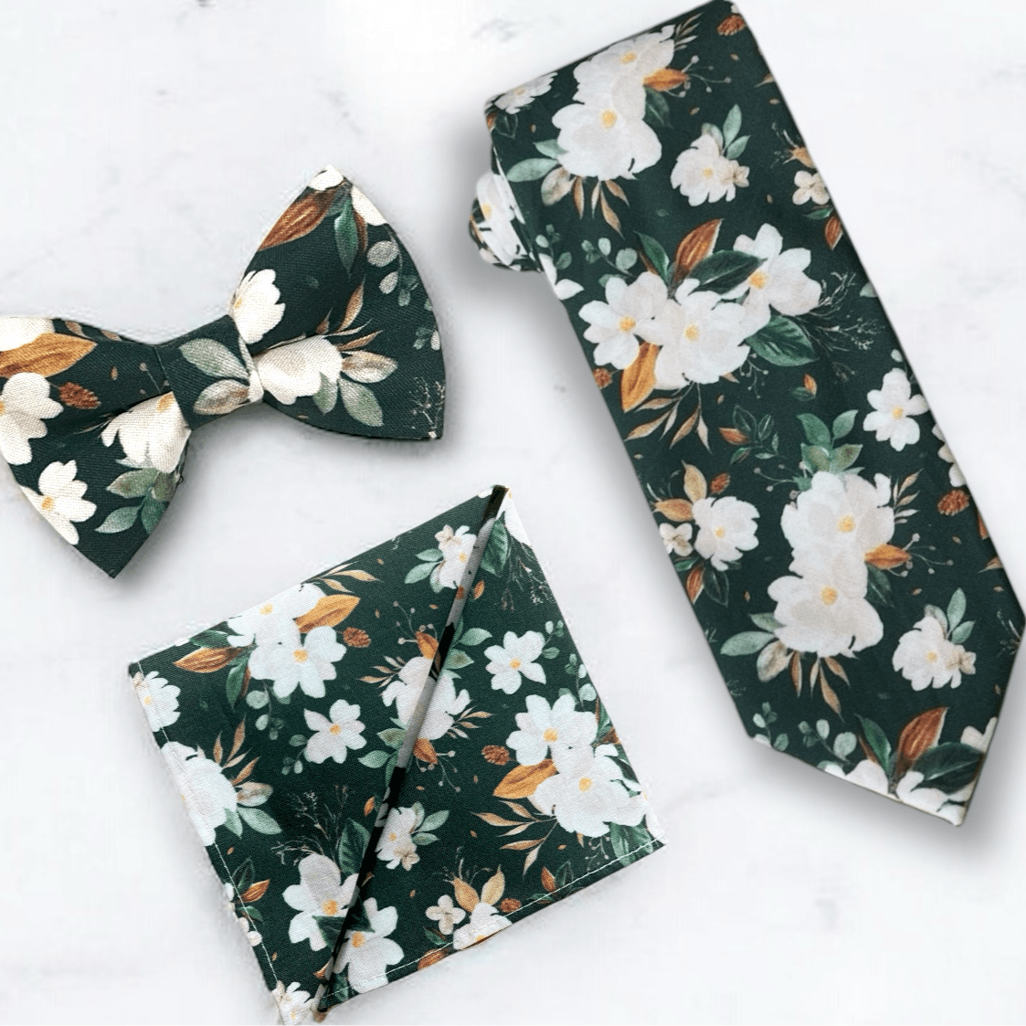 Emerald green floral men’s tie, bow tie and pocket square for wedding or special event.