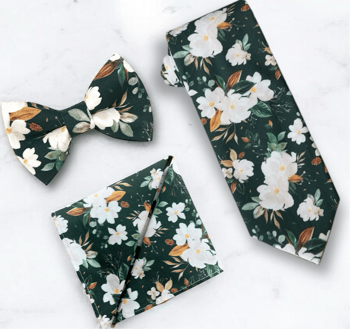Emerald green floral men’s tie, bow tie and pocket square for wedding or special event.