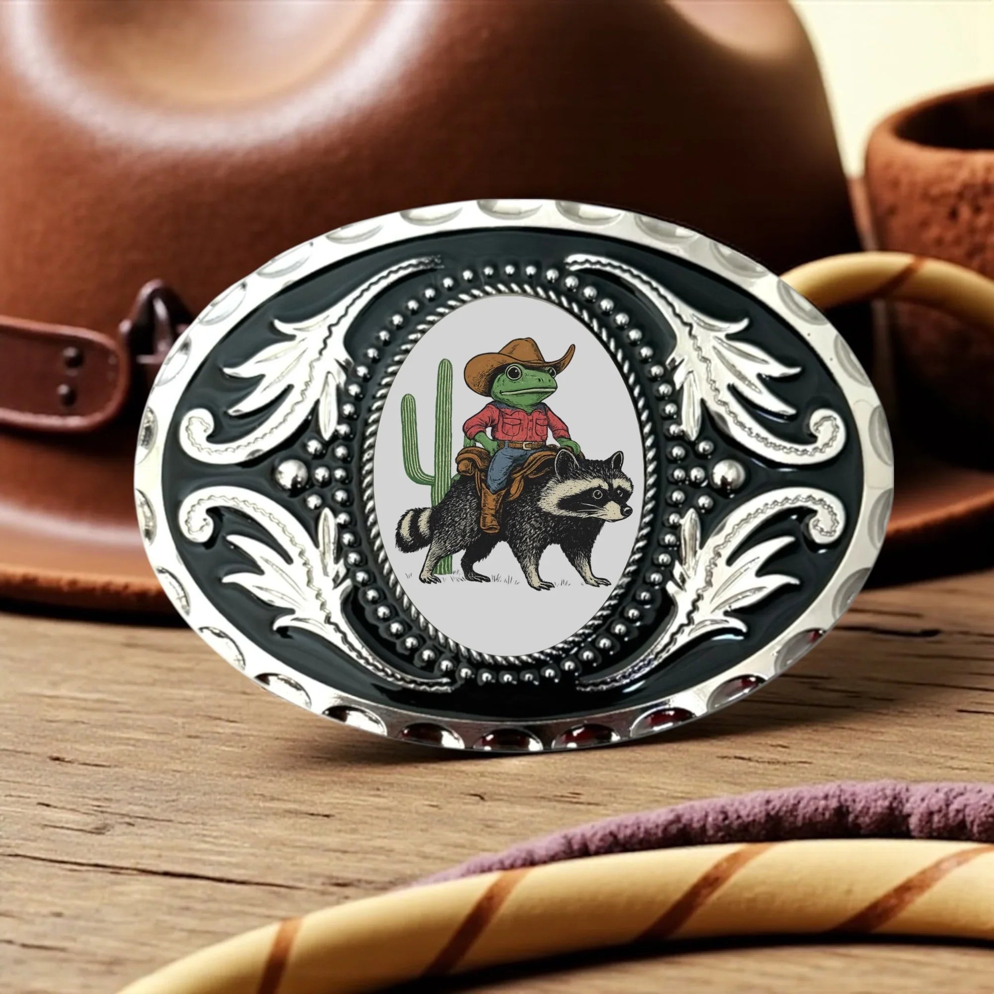 Funny belt buckle with frog and raccoon for men and women.
