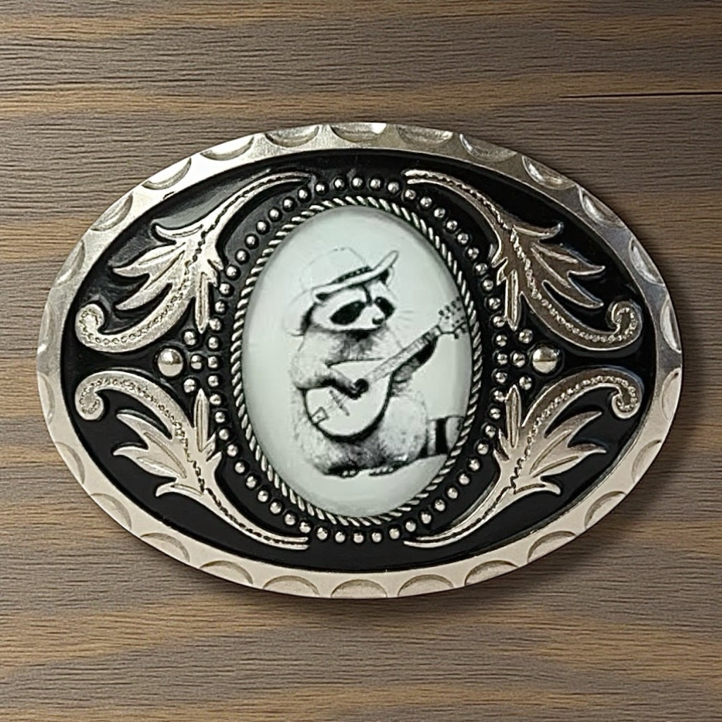 Raccoon Belt Buckle, Western Accessory on a wood table