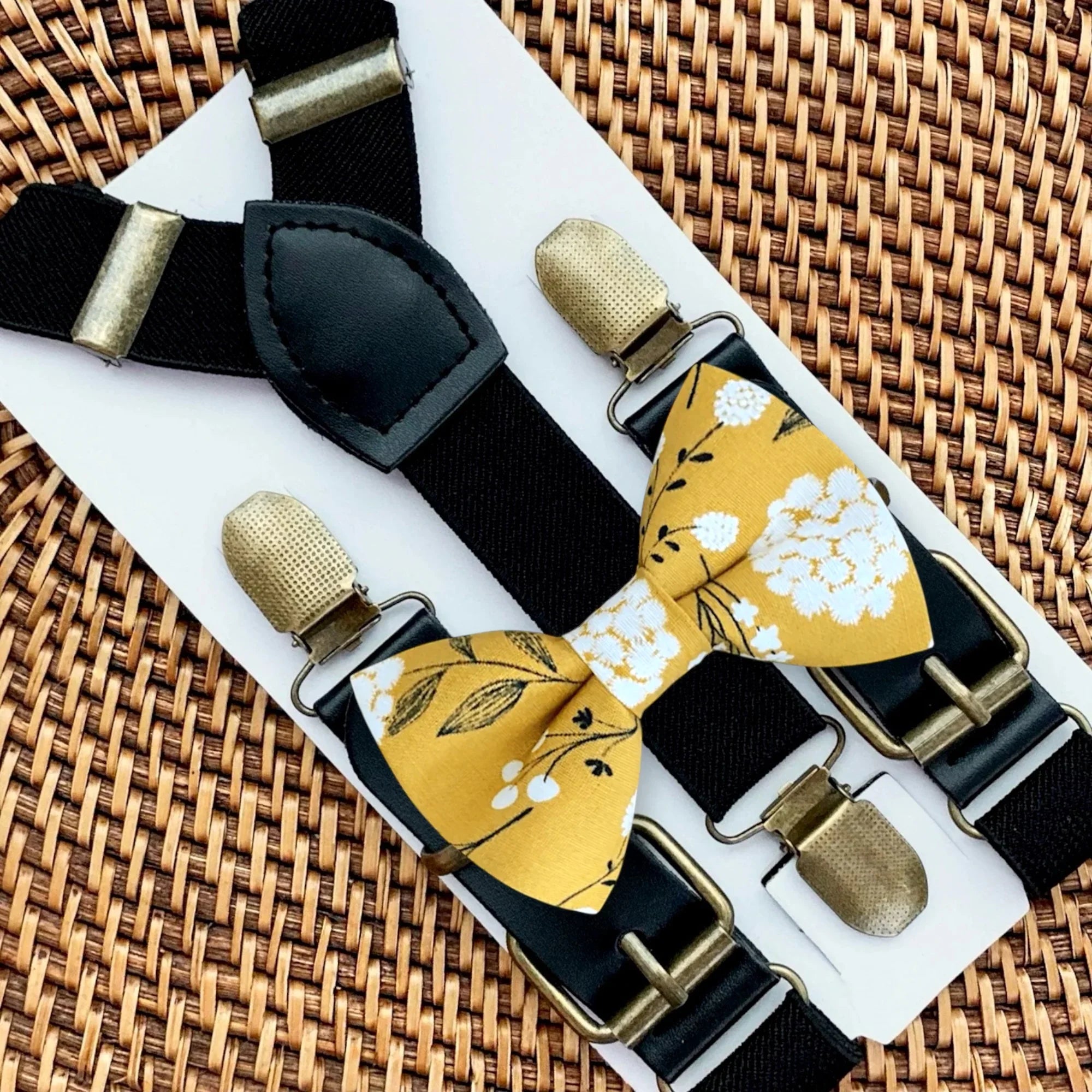 Yellow bow tie and suspenders with floral pattern