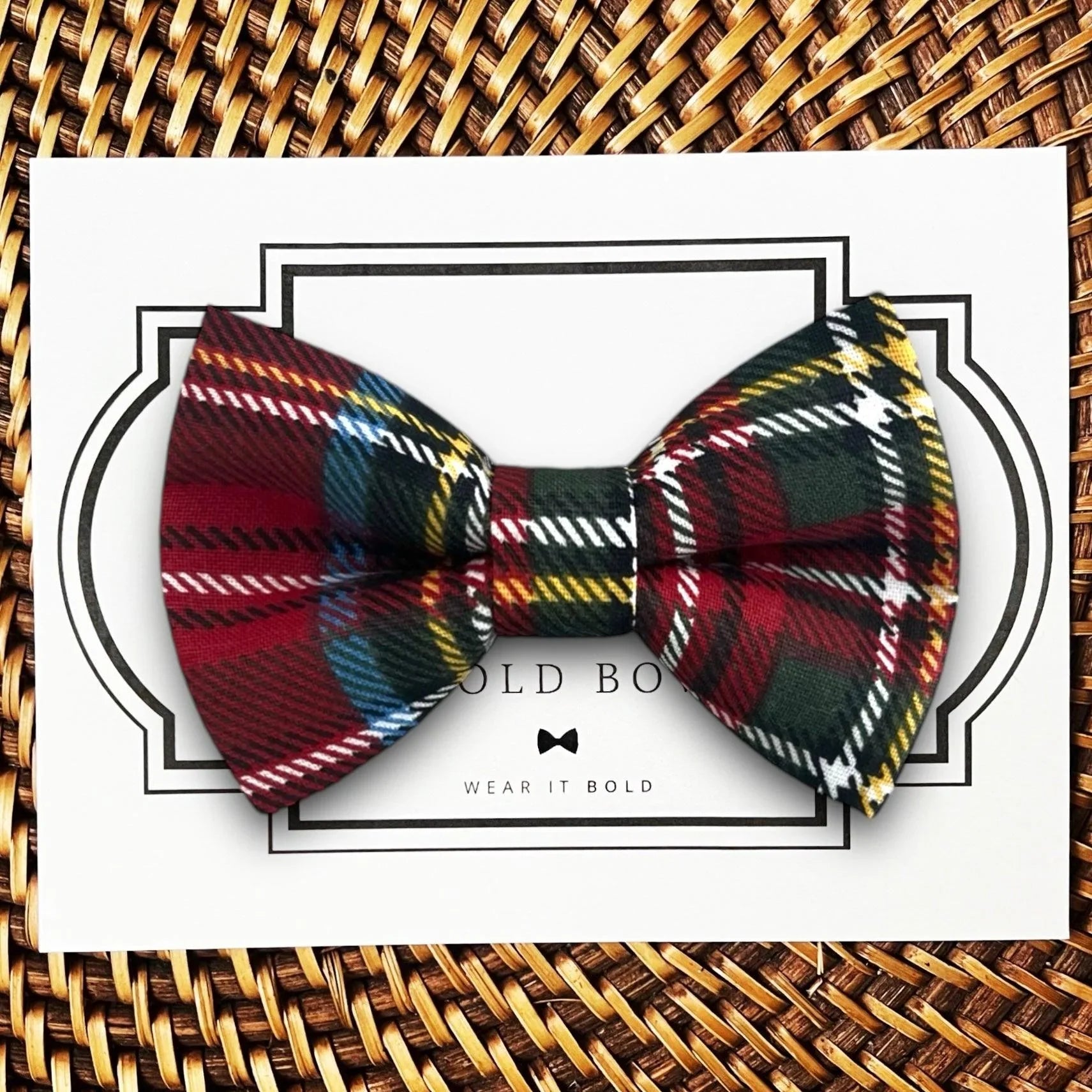 Dog bow tie size chart. Size Small is 3 1/2 inches wide for small dogs under 15 lbs. Size Medium is 4 inches wide for medium dogs between 15 band 40 lbs. Size Large is 4 1/2 inches wide for Large Dogs between 40 band 80 lbs. Size Extra Large is 5 1/2 inches wide for Extra Large Dogs over 80 lbs. Sizing is up to preference and pet bow ties slide on to dog collars with elastic.