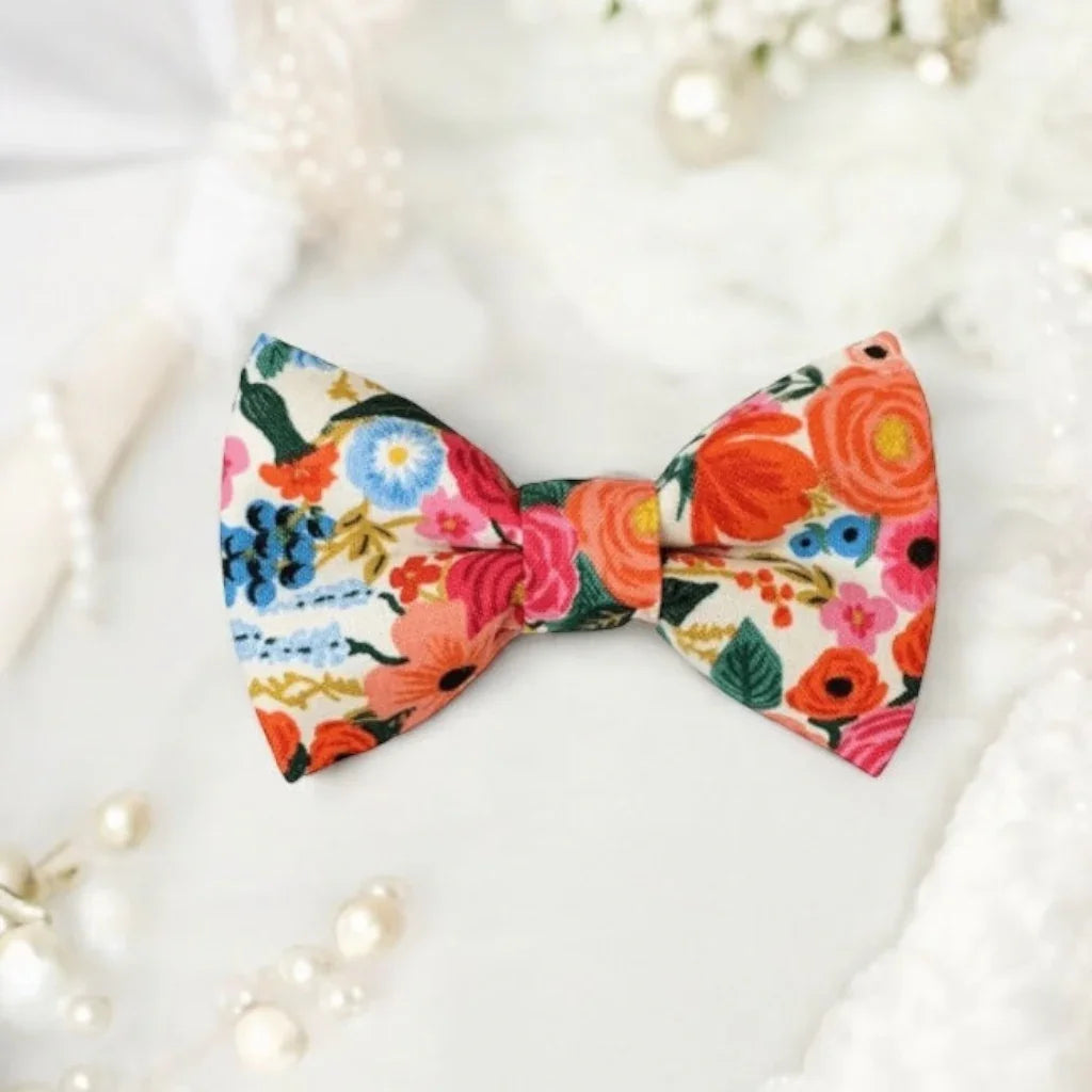 Floral bow tie in orange and green for men, toddlers and boys.