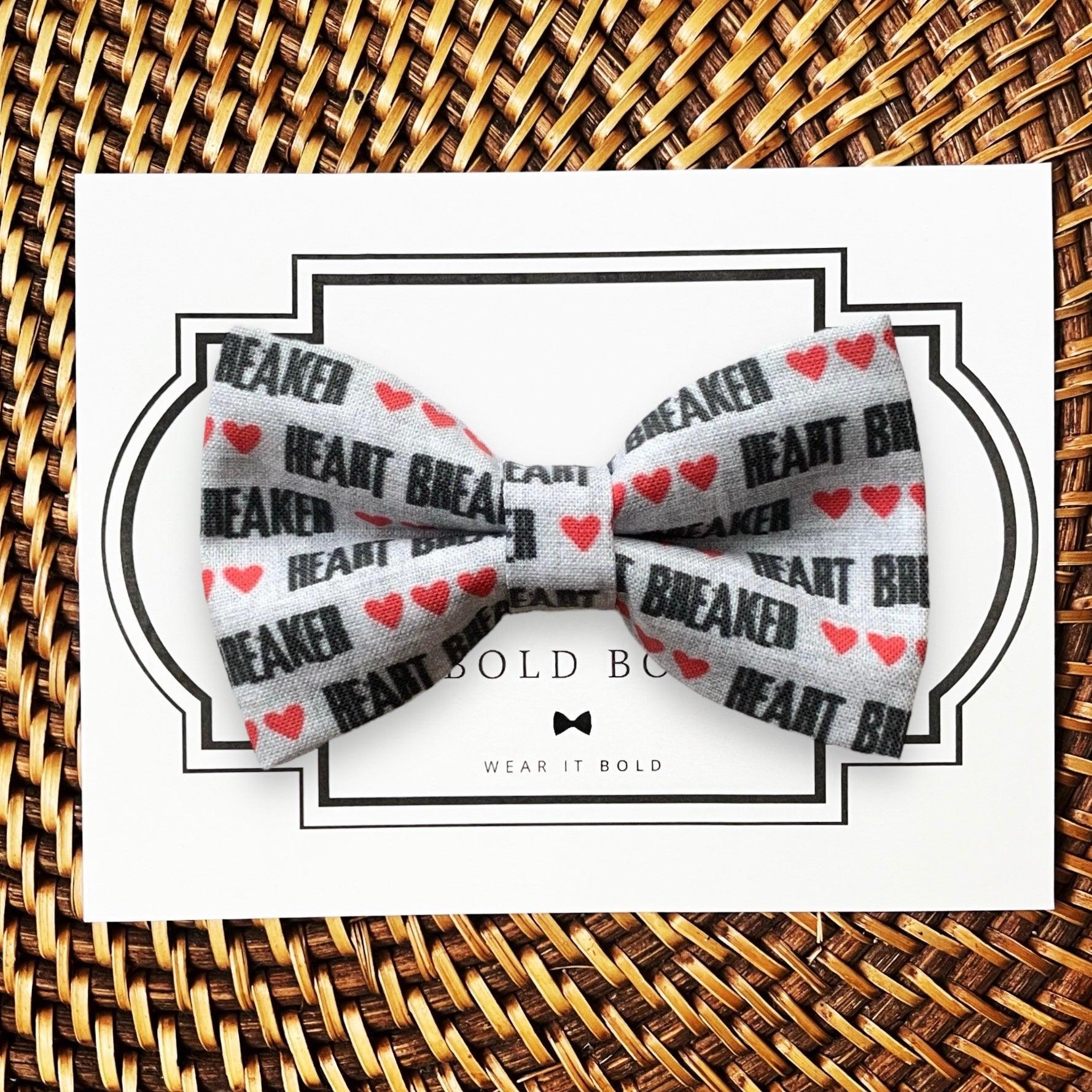 Dog bow tie size chart. Size Small is 3 1/2 inches wide for small dogs under 15 lbs. Size Medium is 4 inches wide for medium dogs between 15 band 40 lbs. Size Large is 4 1/2 inches wide for Large Dogs between 40 band 80 lbs. Size Extra Large is 5 1/2 inches wide for Extra Large Dogs over 80 lbs. Sizing is up to preference and pet bow ties slide on to dog collars with elastic.