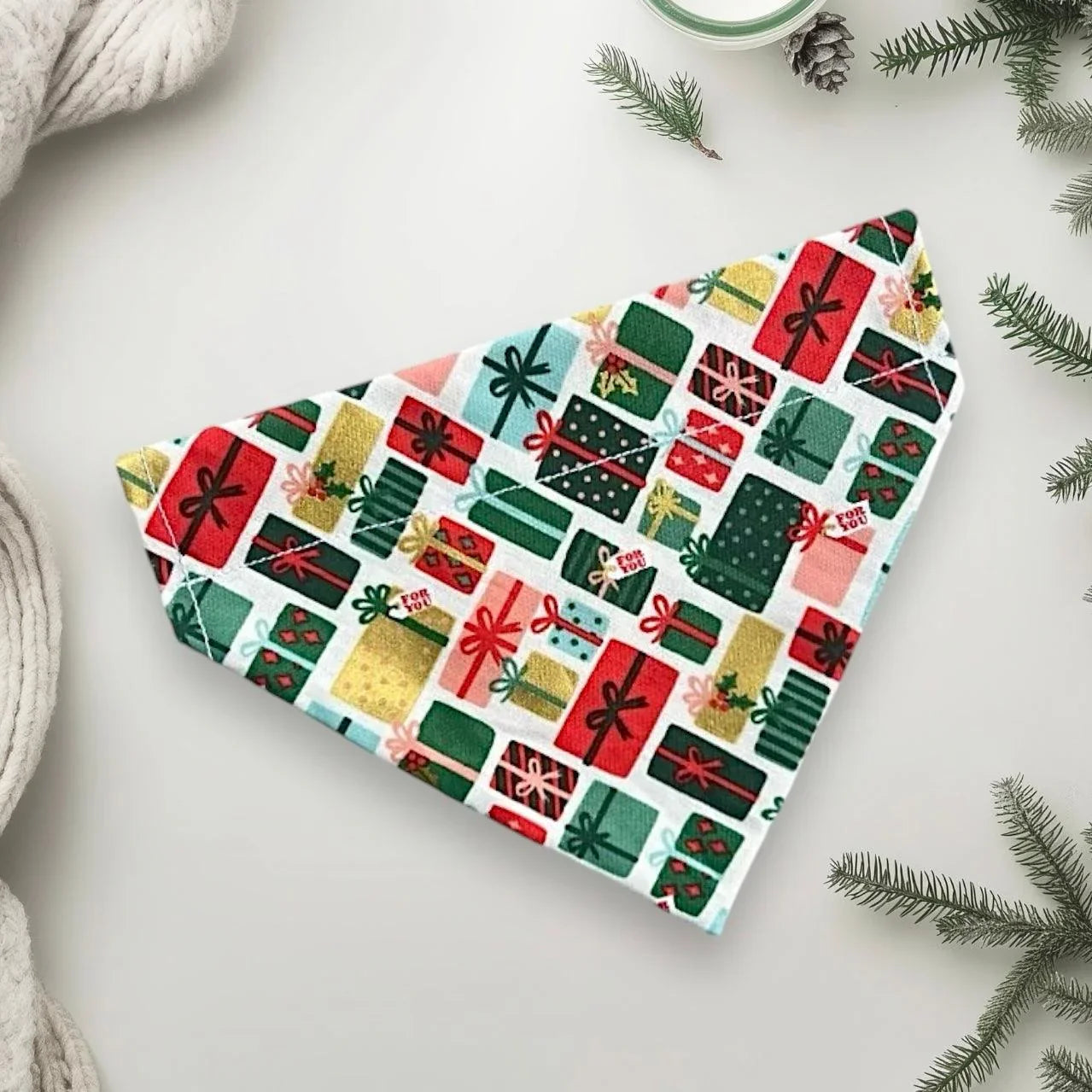 Pet bandana with colorful wrapped gifts pattern in red green and gold Christmas colors